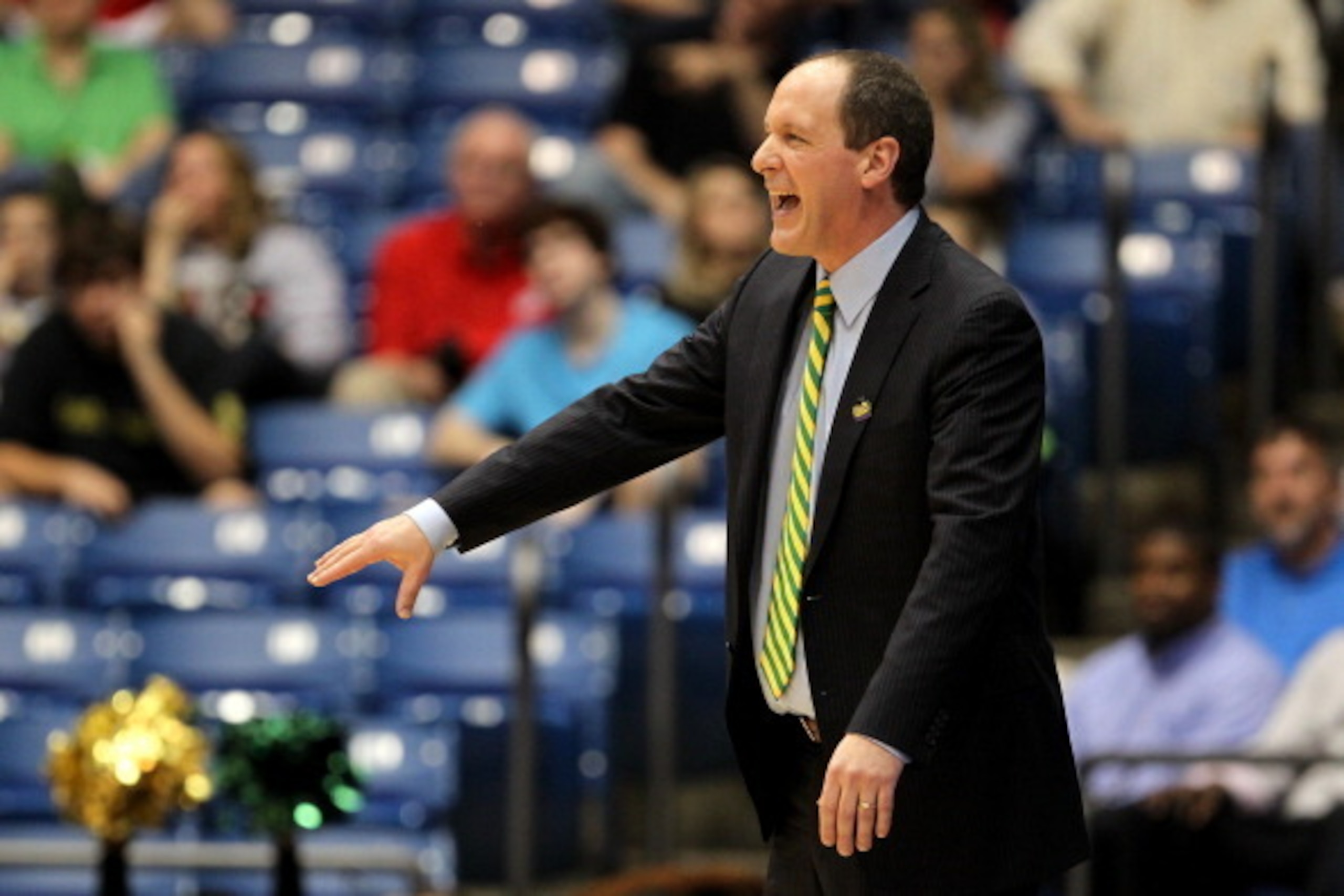 DAYTON, OH - MARCH 14:  Head coach John Becker of the Vermont Catamounts reacts against the Lamar Cardinals in the first round of the 2011 NCAA men's basketball tournament at UD Arena on March 14, 2012 in Dayton, Ohio.  (Photo by Gregory Shamus/Getty Imag