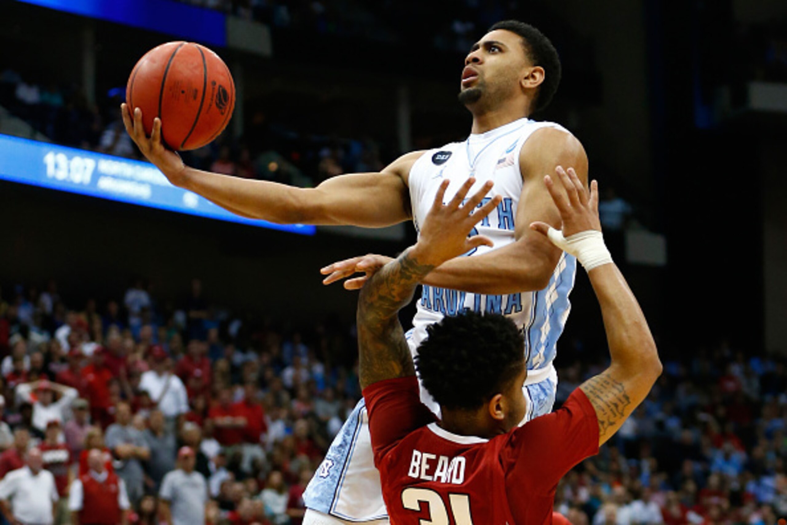JACKSONVILLE, FL - MARCH 21:  Joel Berry II #2 of the North Carolina Tar Heels shoots over Anton Beard #31 of the Arkansas Razorbacks in the second half during the third round of the 2015 NCAA Men's Basketball Tournament at Jacksonville Veterans Memorial 