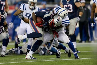 FOXBORO, MA - JANUARY 18:  LeGarrette Blount #29 of the New England Patriots runs with the ball in the first half against the Indianapolis Colts of the 2015 AFC Championship Game at Gillette Stadium on January 18, 2015 in Foxboro, Massachusetts.  (Photo b