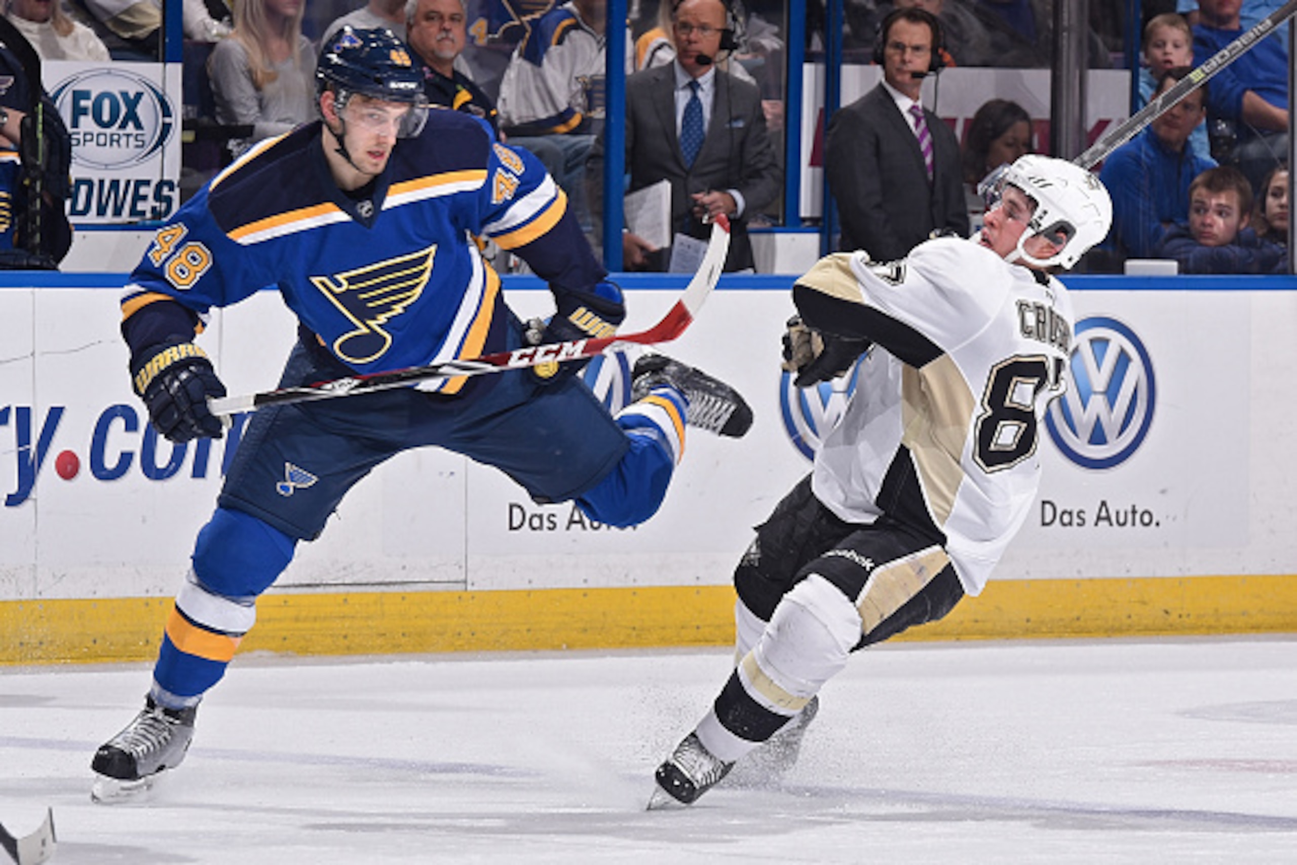 ST. LOUIS, MO - FEBRUARY 21: Petteri Lindbohm #48 of the St. Louis Blues and Sidney Crosby #87 of the Pittsburgh Penguins collide on February 21, 2015 at Scottrade Center in St. Louis, Missouri. (Photo by Scott Rovak/NHLI via Getty Images) ST. LOUIS, MO - FEBRUARY 21: Petteri Lindbohm #48 of the St. Louis Blues and Sidney Crosby #87 of the Pittsburgh Penguins collide on February 21, 2015 at Scottrade Center in St. Louis, Missouri. (Photo by Scott Rovak/NHLI via Getty Images)