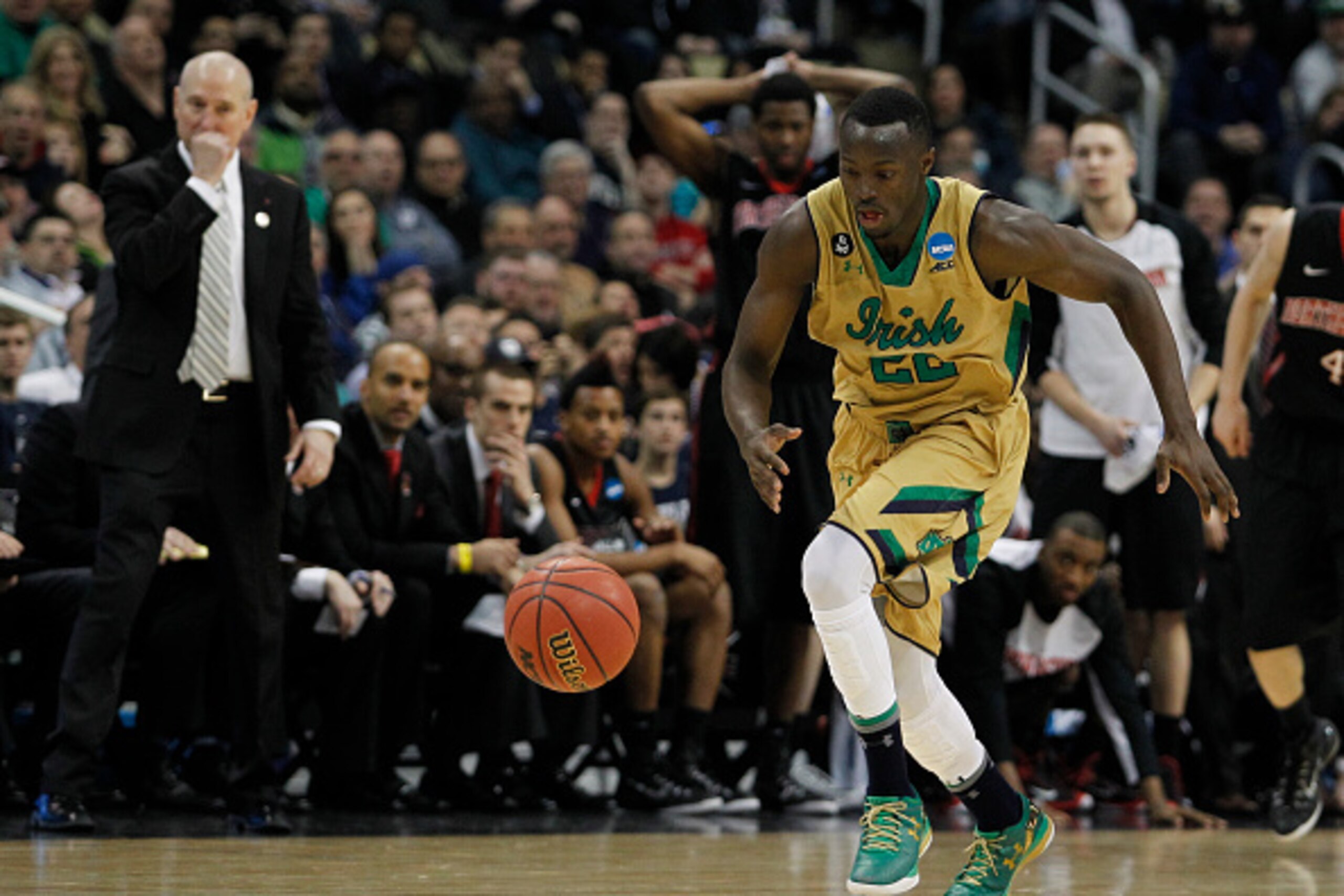 PITTSBURGH, PA - MARCH 19:  Jerian Grant #22 of the Notre Dame Fighting Irish plays against the Northeastern Huskies during the second round of the 2015 NCAA Men's Basketball Tournament at Consol Energy Center on March 19, 2015 in Pittsburgh, Pennsylvania
