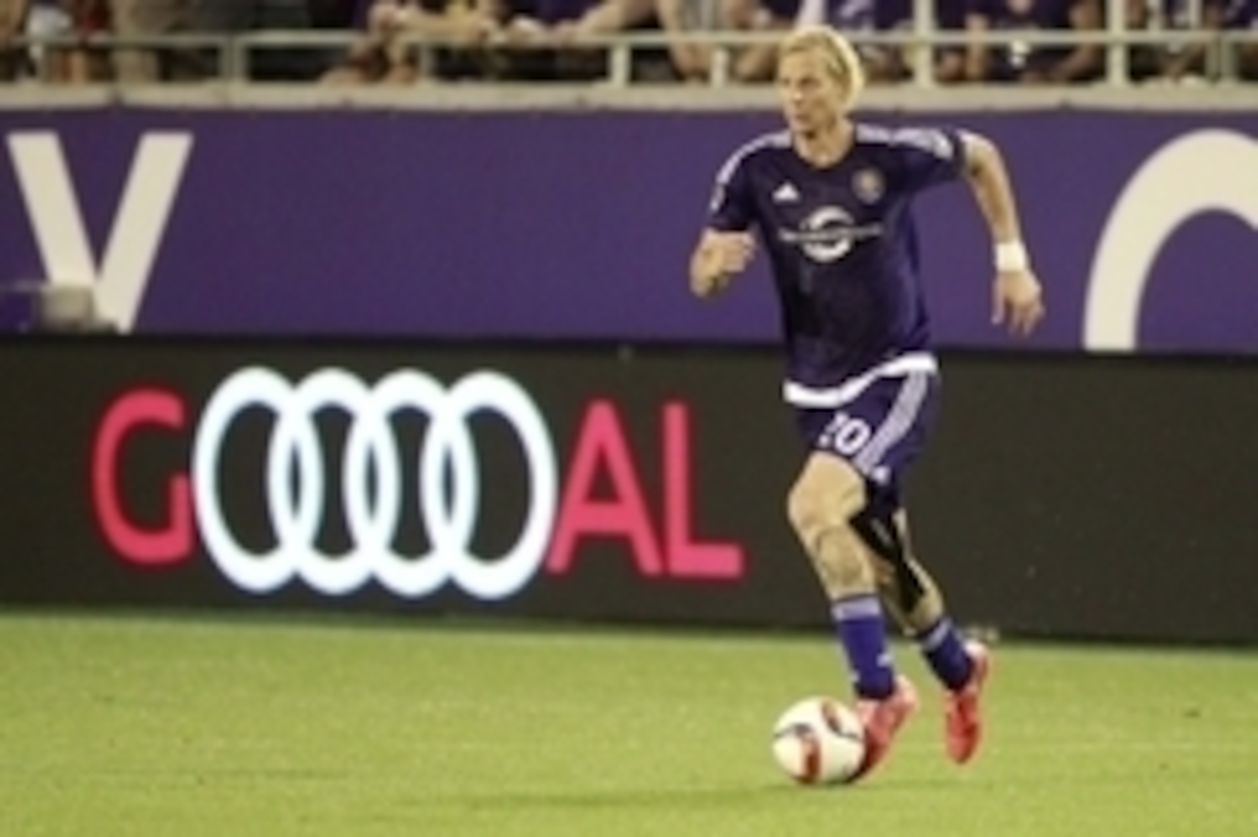 Mar 21, 2015; Orlando, FL, USA; Orlando City SC midfielder/defender Brek Shea (20) controls the ball against the Vancouver FC during the second half at Orlando Citrus Bowl. Vancouver FC defeated the Orlando City SC 1-0. Mandatory Credit: Kim Klement-USA T