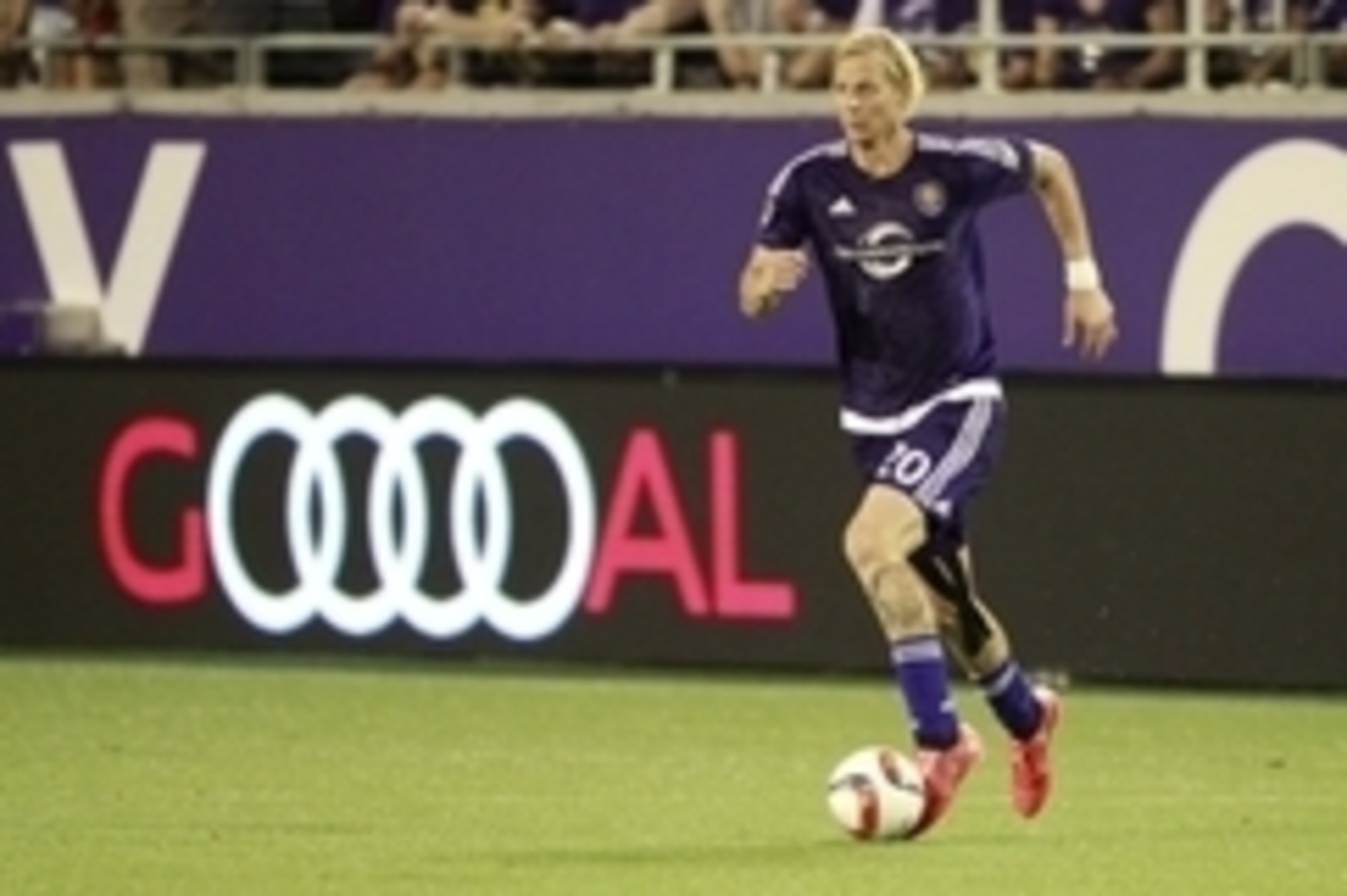 Mar 21, 2015; Orlando, FL, USA; Orlando City SC midfielder/defender Brek Shea (20) controls the ball against the Vancouver FC during the second half at Orlando Citrus Bowl. Vancouver FC defeated the Orlando City SC 1-0. Mandatory Credit: Kim Klement-USA T