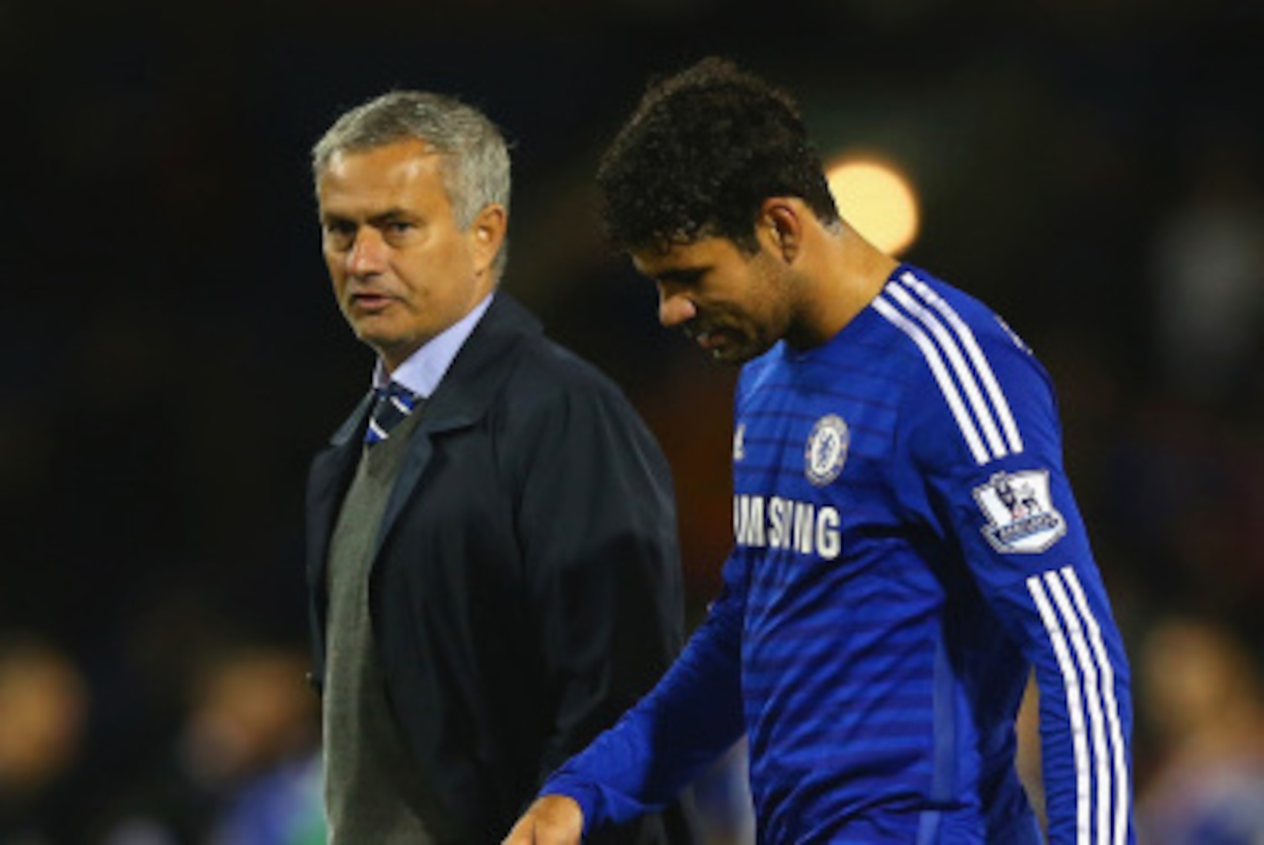 BURNLEY, ENGLAND - AUGUST 18:  Manager Jose Mourinho of Chelsea speaks to Diego Costa of Chelsea after the Barclays Premier League match between Burnley and Chelsea at Turf Moor on August 18, 2014 in Burnley, England.  (Photo by Clive Brunskill/Getty Imag