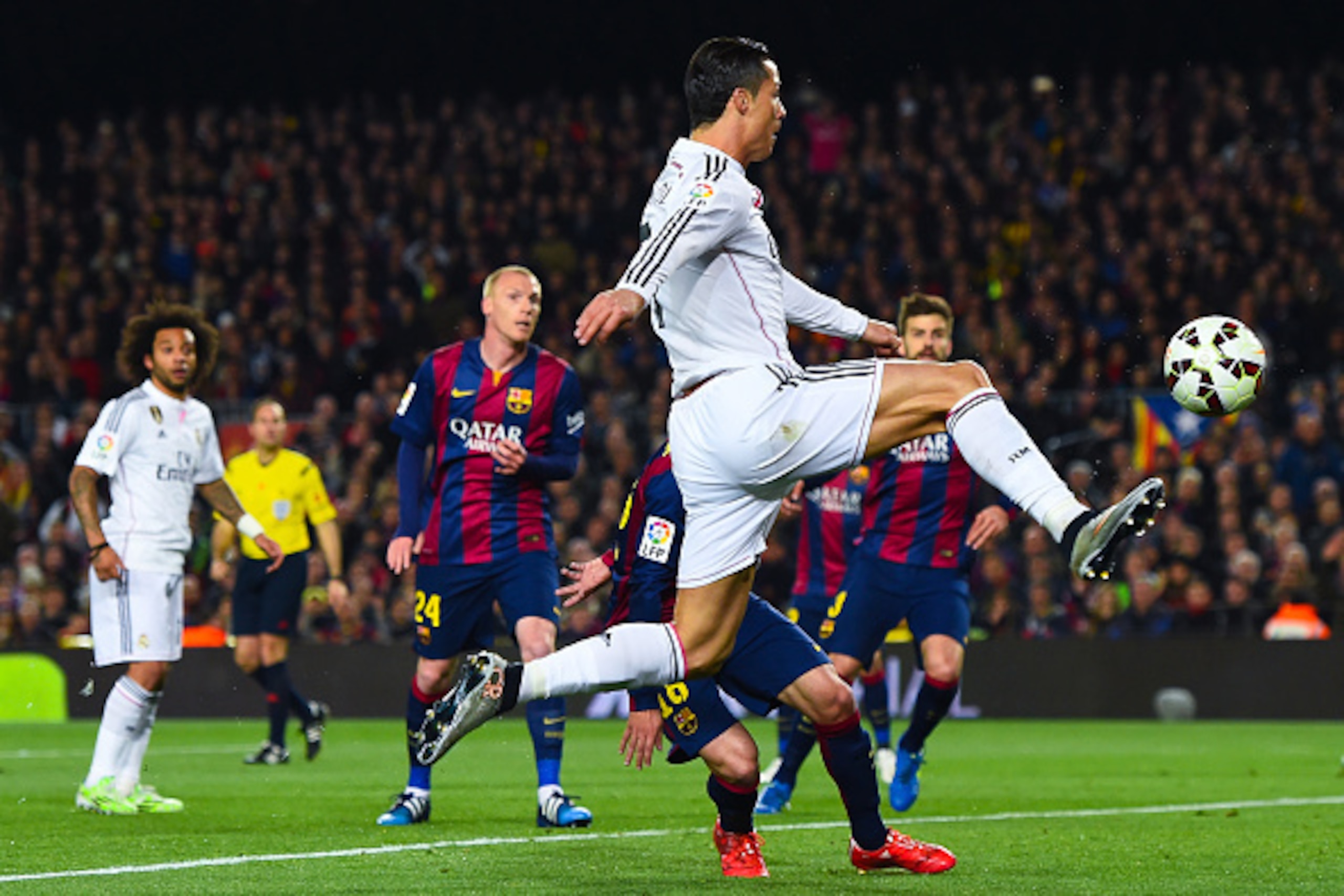 BARCELONA, SPAIN - MARCH 22:  Cristiano Ronaldo of Real Madrid CF kicks the ball towards goal during the La Liga match Between FC Barcelona and Real Madrid CF at Camp Nou on March 22, 2015 in Barcelona, Spain.  (Photo by David Ramos/Getty Images)