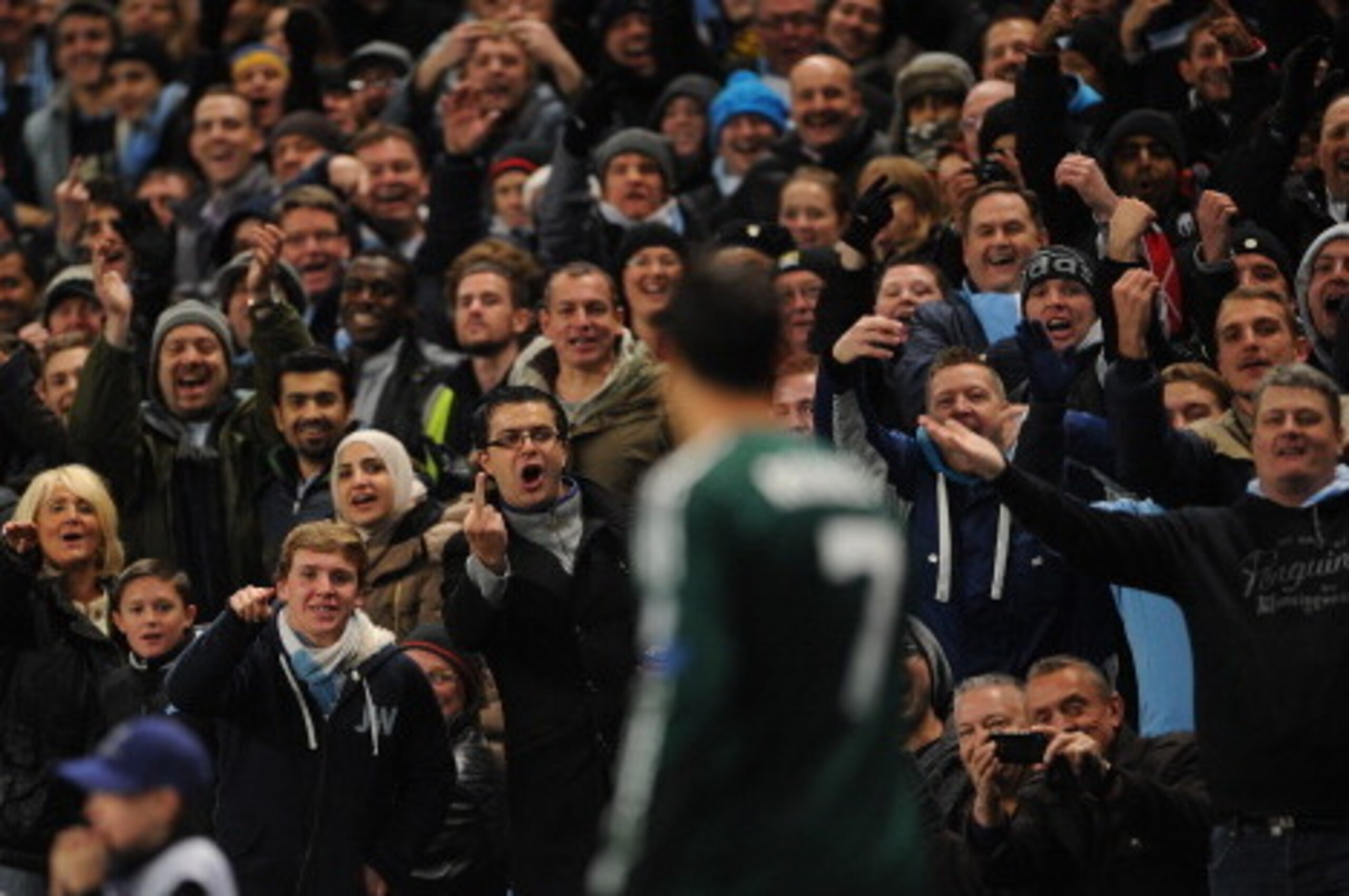 MANCHESTER, ENGLAND - NOVEMBER 21:  Manchester City fans react to Cristiano Ronaldo of Real Madrid during the UEFA Champions League Group D match between Manchester City FC and Real Madrid CF at the Etihad Stadium on November 21, 2012 in Manchester, Engla