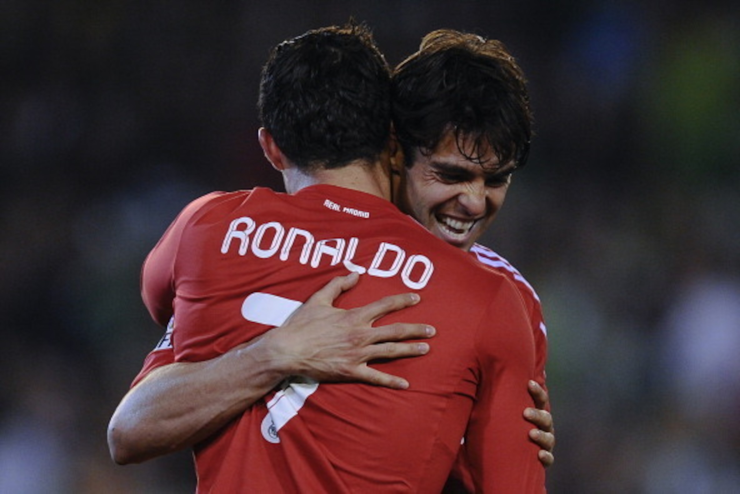 SEVILLE, SPAIN - MARCH 10:  Kaka of Real Madrid CF (R) celebrates with his teammate Cristiano Ronaldo after Ronaldo scored his team's second goal during the La Liga match between Real Betis Balompie and Real Madrid CF at Estadio Benito Villamarin on March