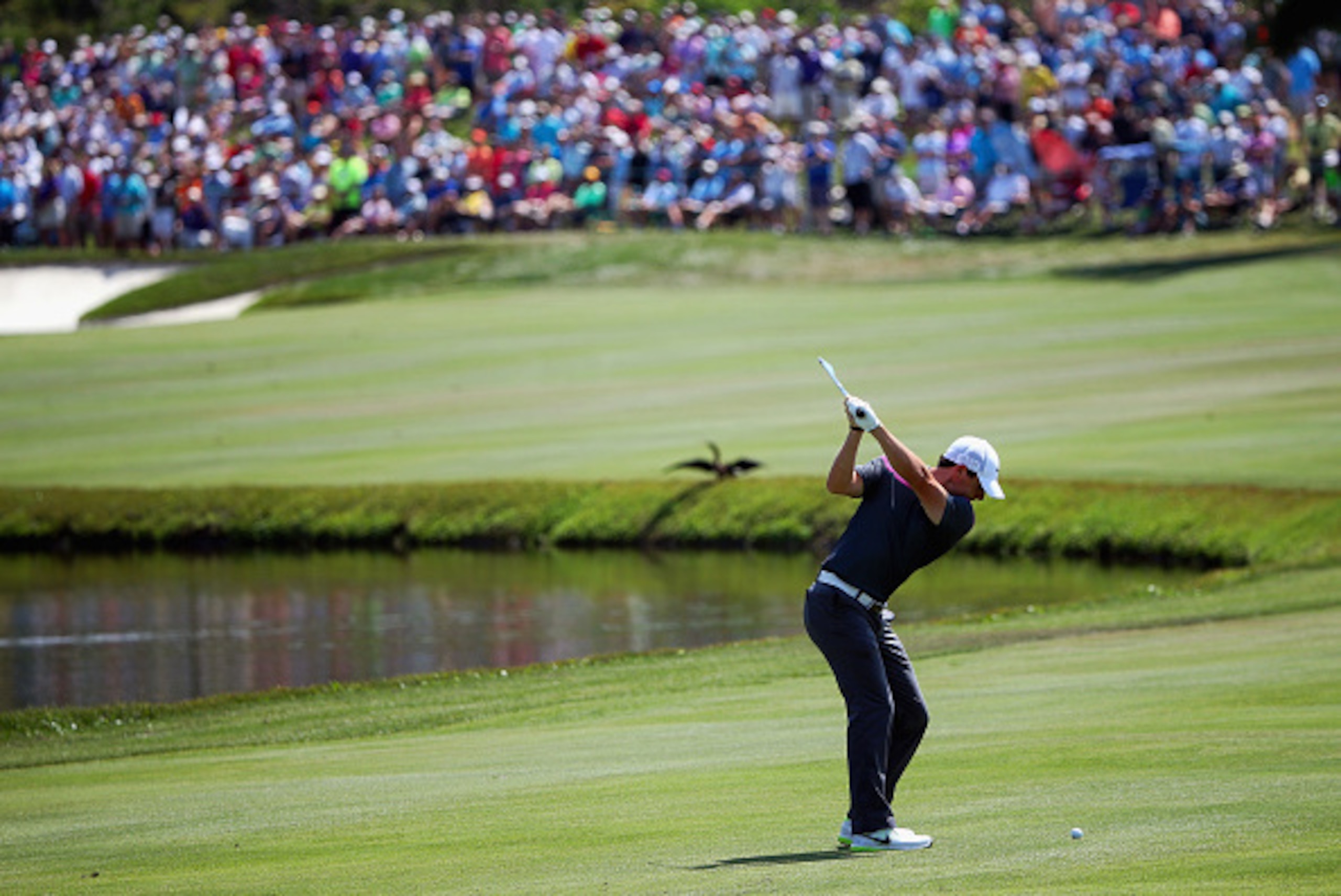 ORLANDO, FL - MARCH 21:  Rory McIlroy of Northern Ireland hits an approach shot on the sixth hole during the third round of the Arnold Palmer Invitational Presented By MasterCard at the Bay Hill Club and Lodge on March 21, 2015 in Orlando, Florida.  (Phot