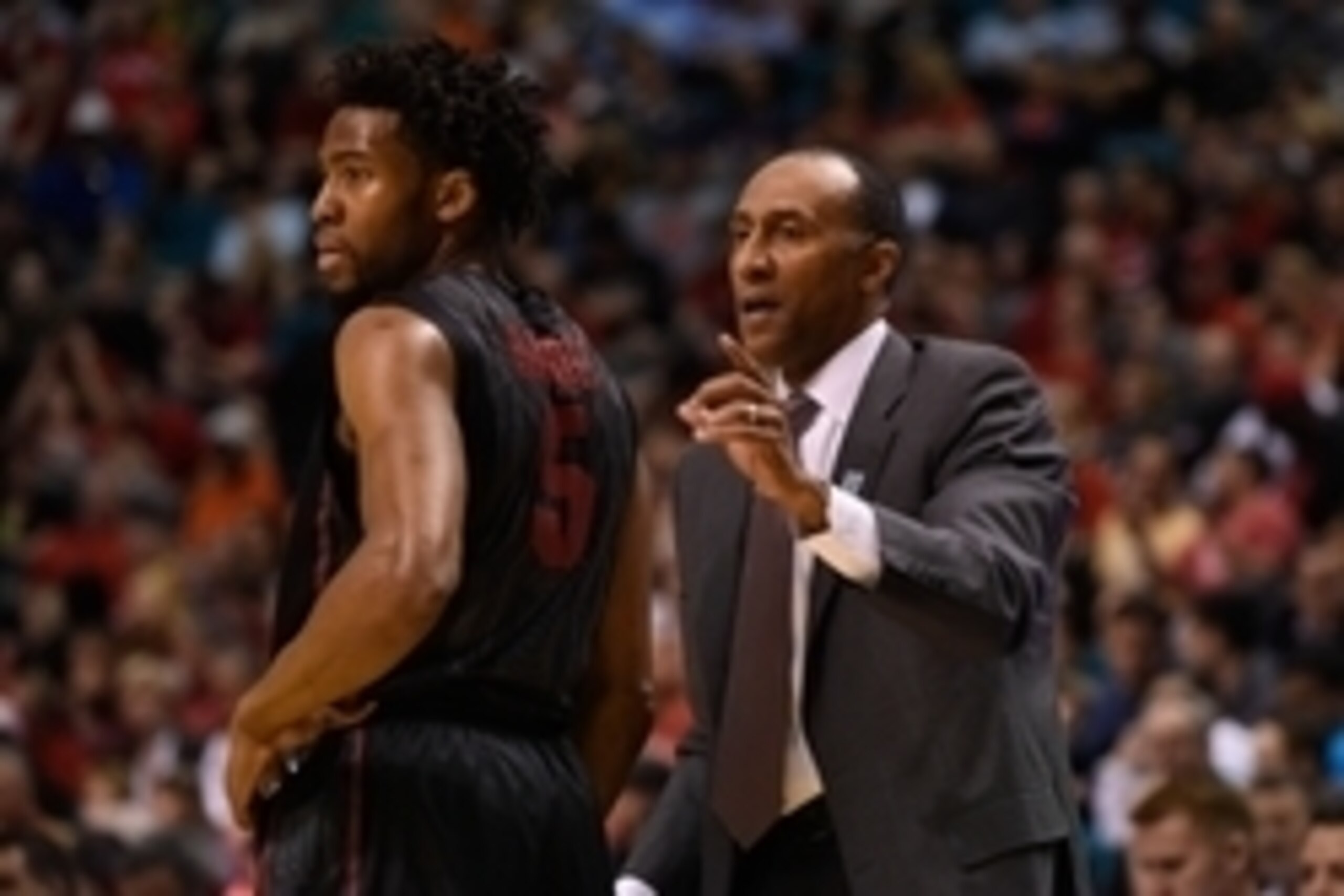 March 12, 2015; Las Vegas, NV, USA; Stanford Cardinal head coach Johnny Dawkins (right) instructs guard Chasson Randle (5) against the Utah Utes during the first half in the quarterfinal round of the Pac-12 Conference tournament at MGM Grand Garden Arena.