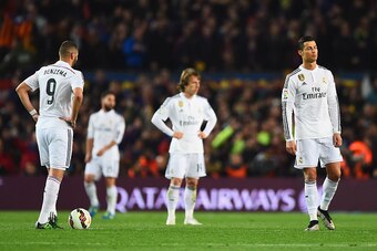 BARCELONA, SPAIN - MARCH 22:  (L-R) Karim Benzema, Luka Modric and Cristiano Ronaldo of Real Madrid CF look dejected as Luis Suarez of Barcelona scores their second goal during the La Liga match between FC Barcelona and Real Madrid CF at Camp Nou on March