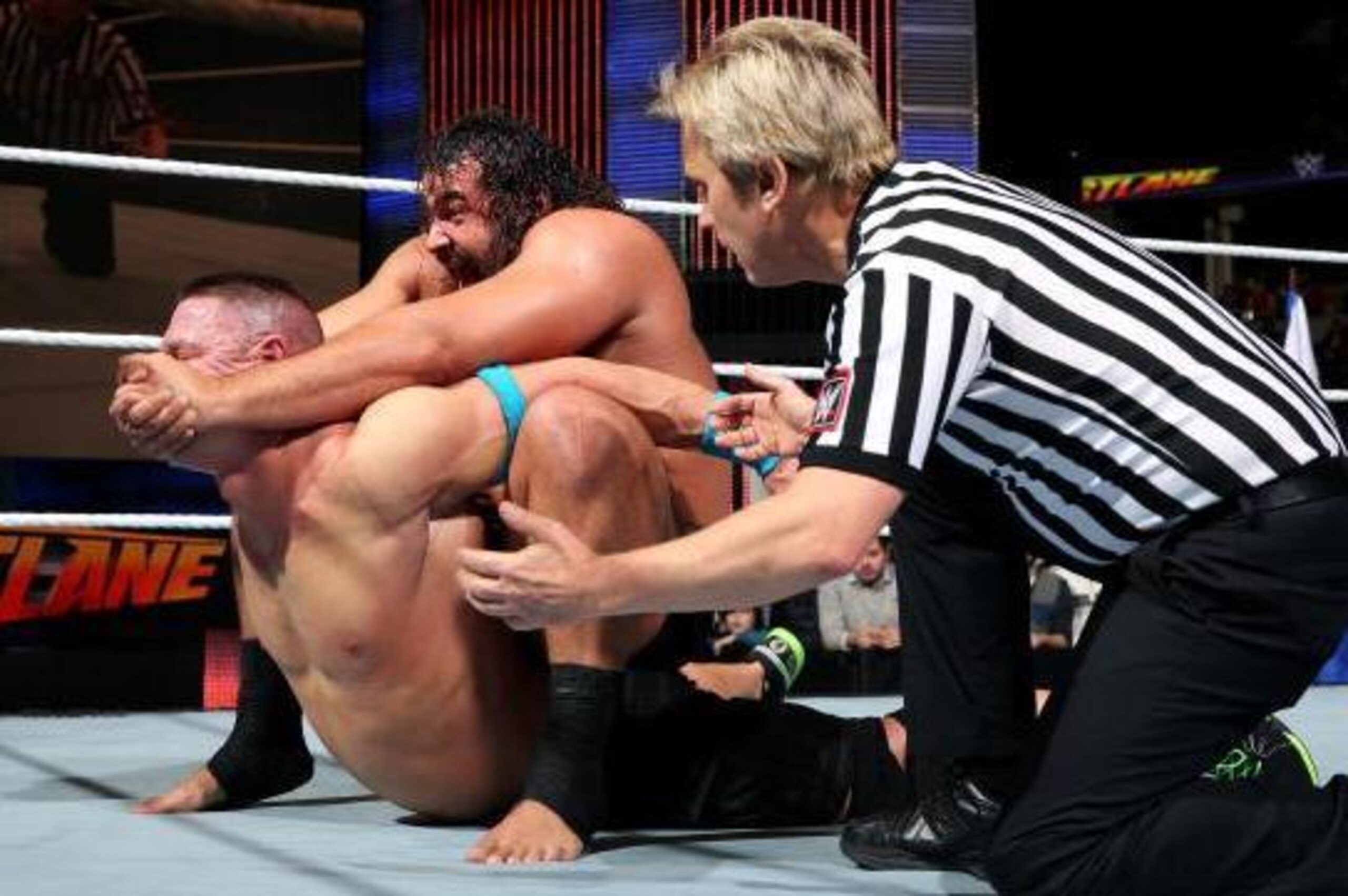 Rusev traps John Cena in The Accolade.