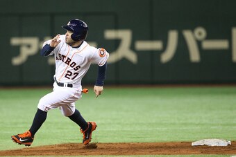 TOKYO, JAPAN - NOVEMBER 16:  Jose Altuve #27 of the Houston Astros runs in the third inning during the game four of Samurai Japan and MLB All Stars at Tokyo Dome on November 16, 2014 in Tokyo, Japan.  (Photo by Atsushi Tomura/Getty Images)