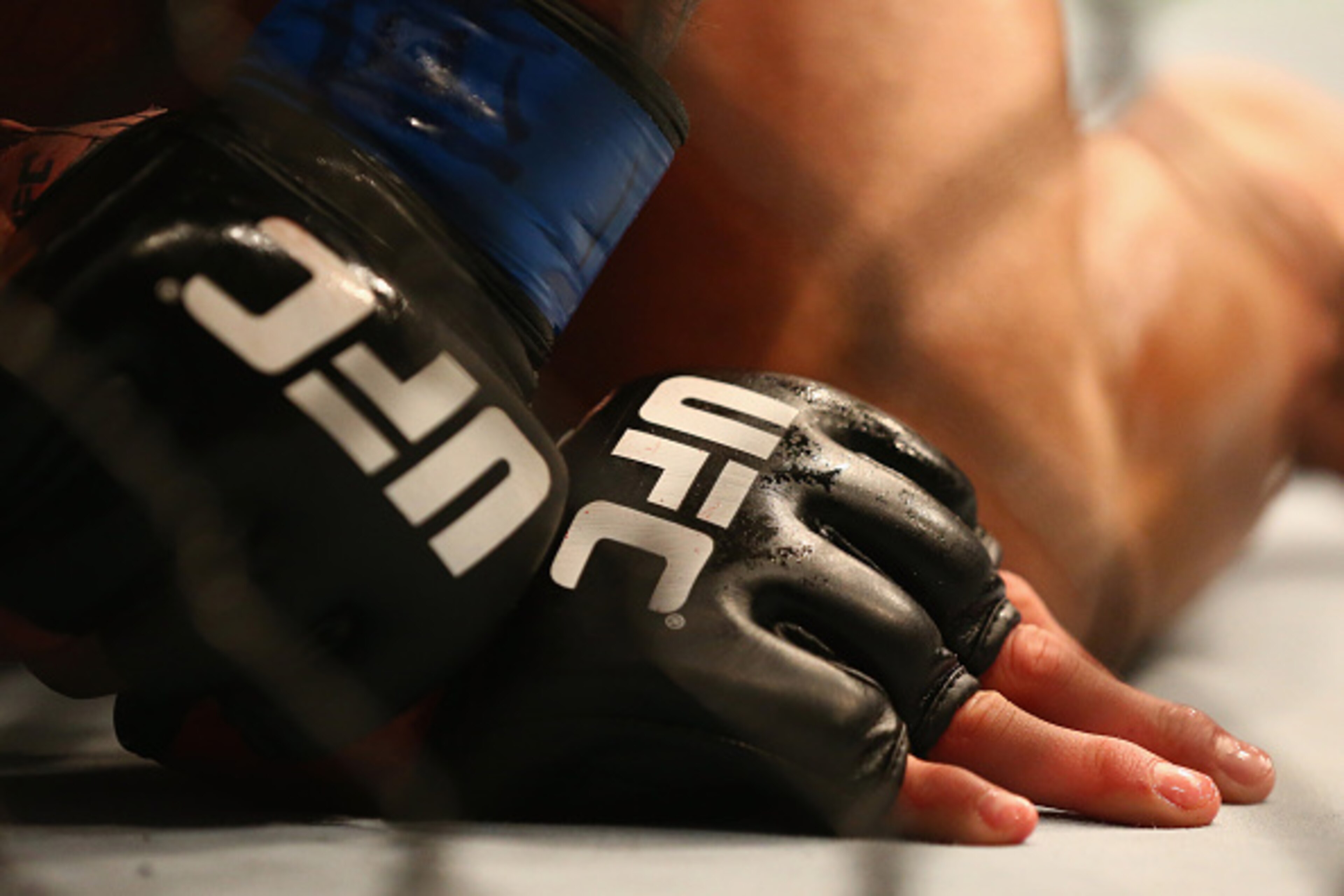 DALLAS, TX - MARCH 14:  A detail of gloves worn by Anthony Pettis and Rafael dos Anjos in the Lightweight Title bout during the UFC 185 event at American Airlines Center on March 14, 2015 in Dallas, Texas.  (Photo by Ronald Martinez/Getty Images)