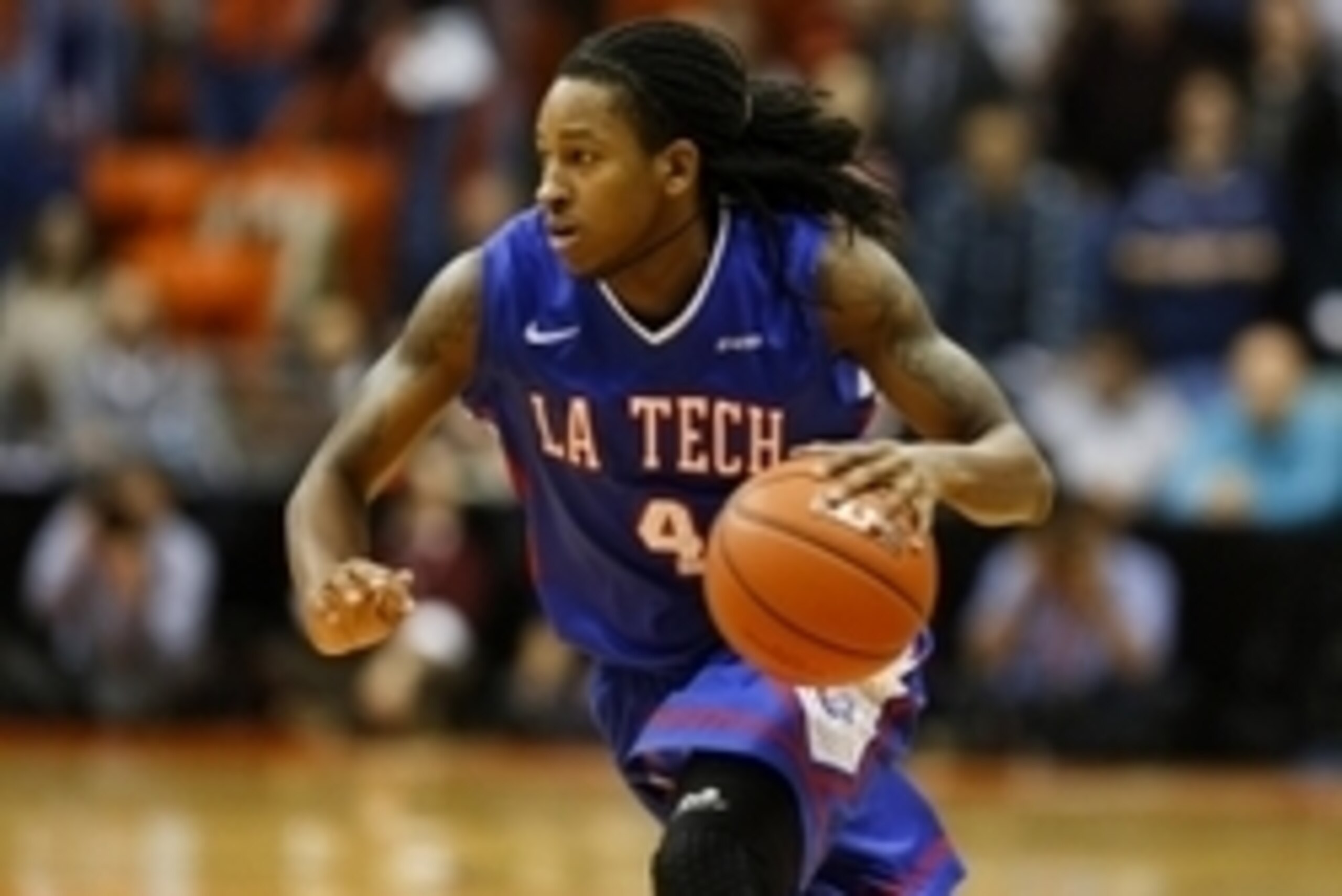 Jan 8, 2015; El Paso, TX, USA; Louisiana Tech Bulldogs guard Kenneth Smith (4) dribbles the ball against the UTEP Miners at the Don Haskins Center. The Bulldogs defeated the Miners 58-45. Mandatory Credit: Ivan Pierre Aguirre-USA TODAY Sports
