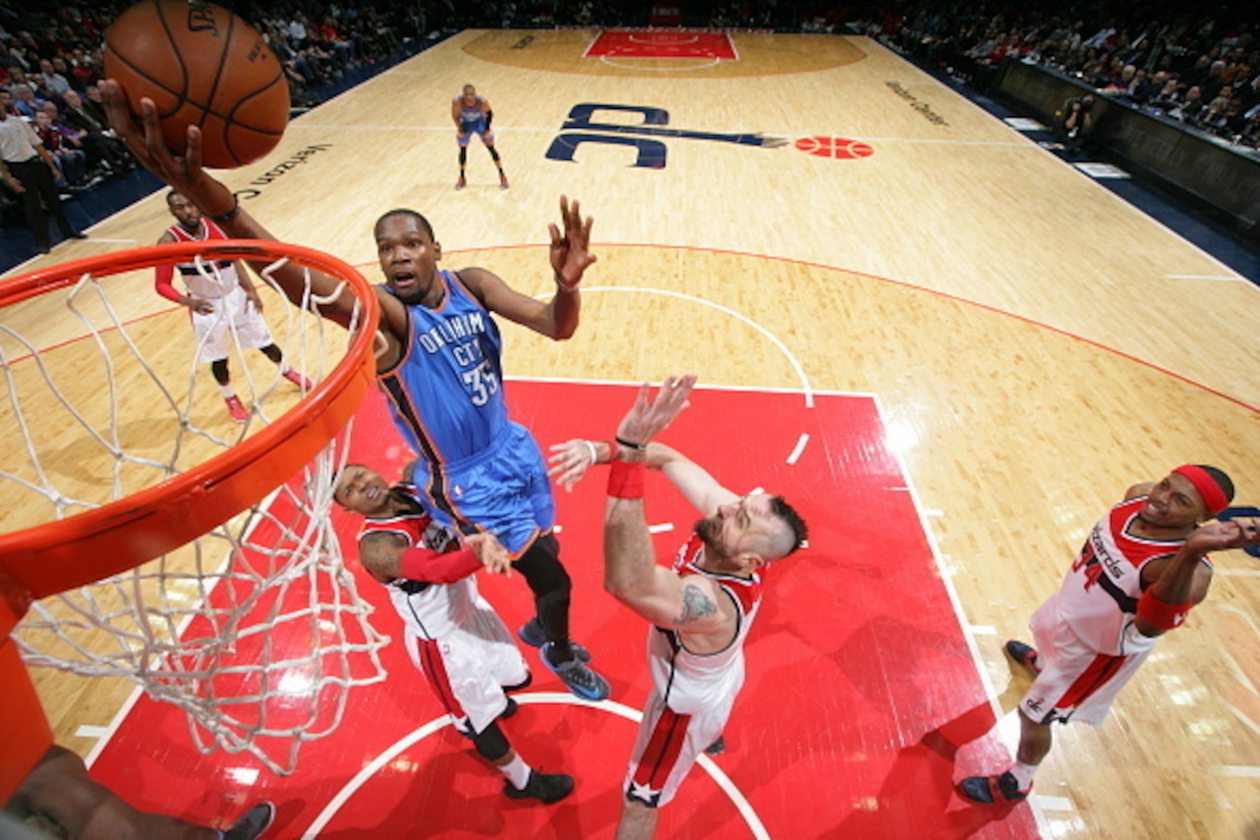 WASHINGTON, DC -  JANUARY 21: Kevin Durant #35 of the Oklahoma City Thunder shoots against the Washington Wizards Thunder on January 21, 2015 at Verizon Center in Washington, DC. NOTE TO USER: User expressly acknowledges and agrees that, by downloading an