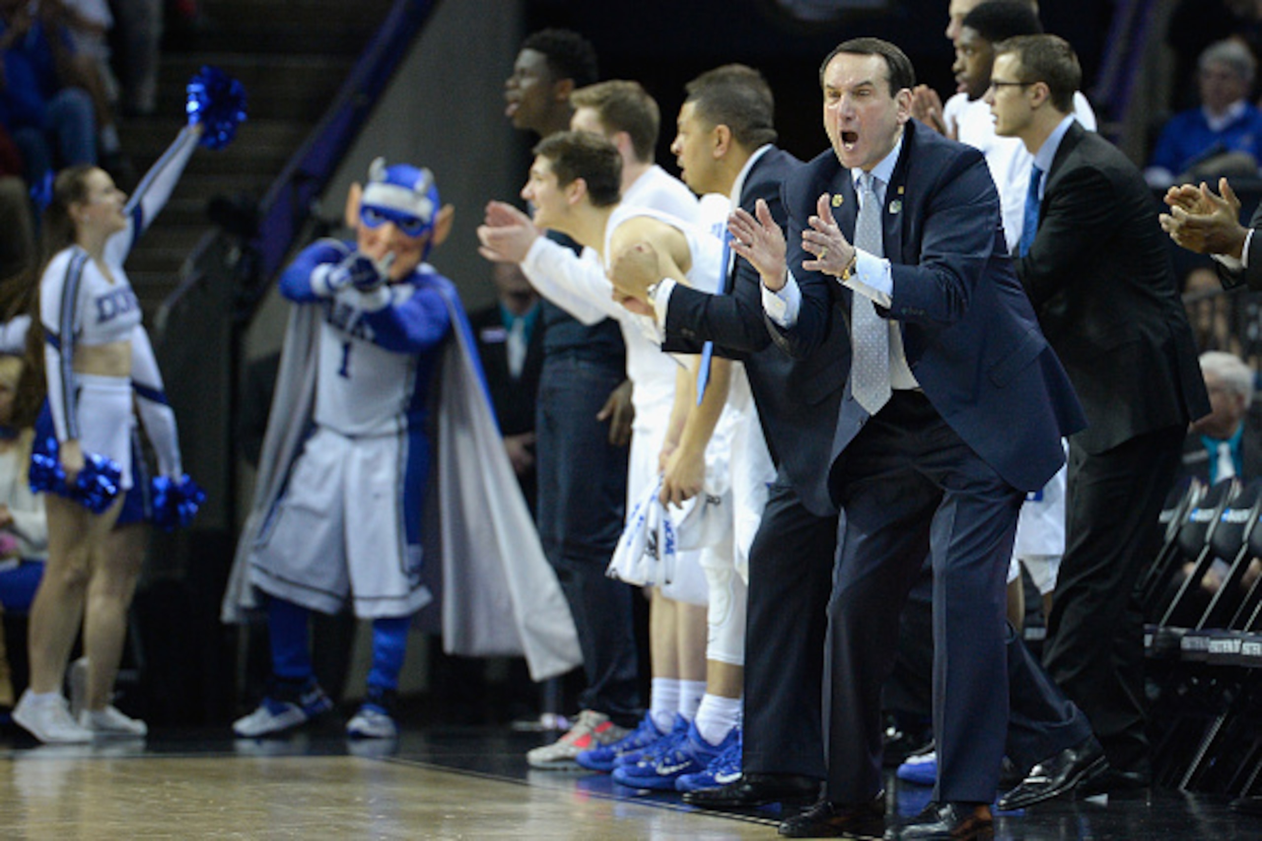 CHARLOTTE, NC - MARCH 22:  Head coach Mike Krzyzewski of the Duke Blue Devils reacts against the San Diego State Aztecs during the third round of the 2015 NCAA Men's Basketball Tournament at Time Warner Cable Arena on March 22, 2015 in Charlotte, North Ca
