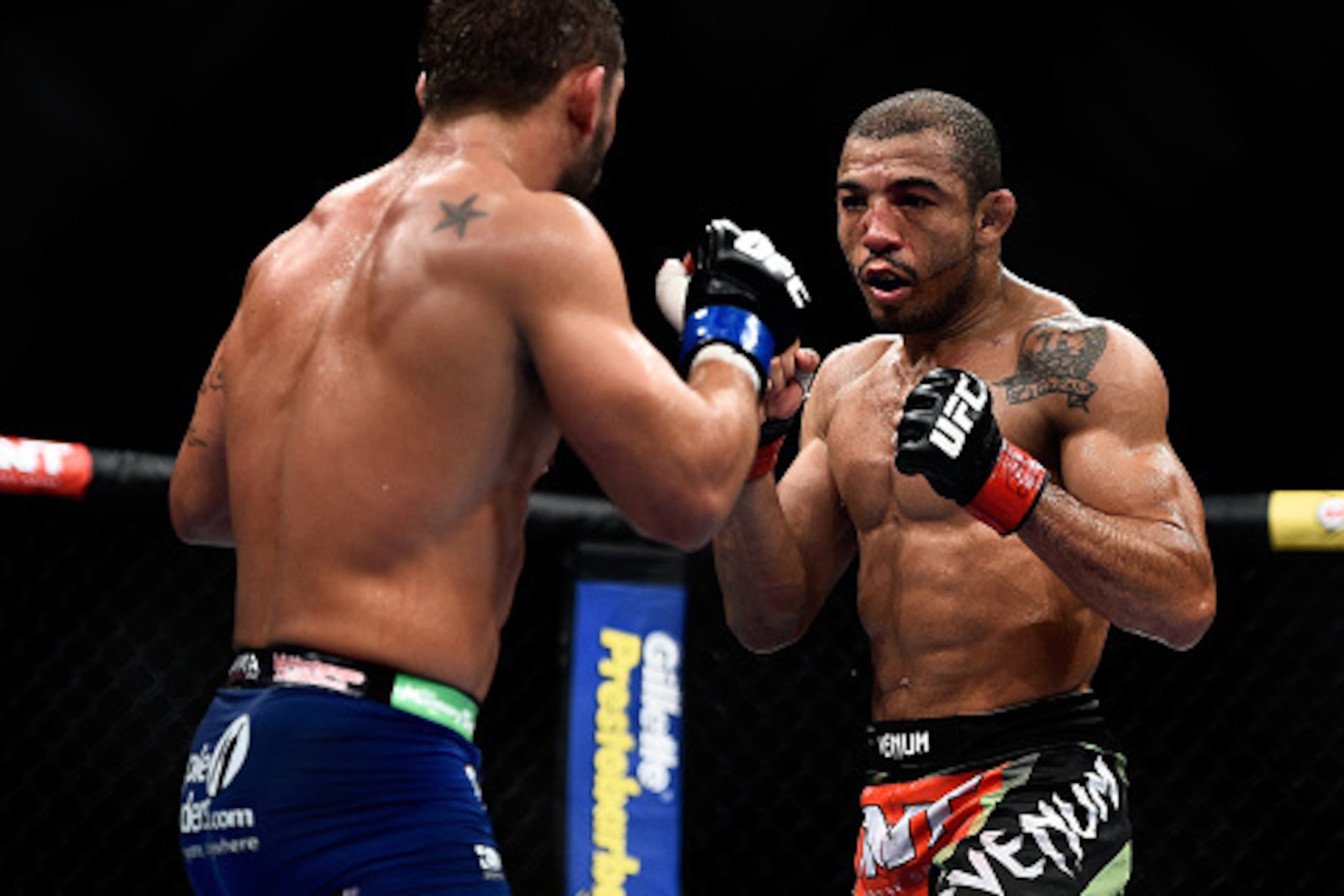 RIO DE JANEIRO, BRAZIL - OCTOBER 25: Chad Mendes of the United States and Jose Aldo of Brazil in their featherweight championship bout during the UFC 179 event at Maracanazinho on October 25, 2014 in Rio de Janeiro, Brazil. (Photo by Buda Mendes/Getty Ima