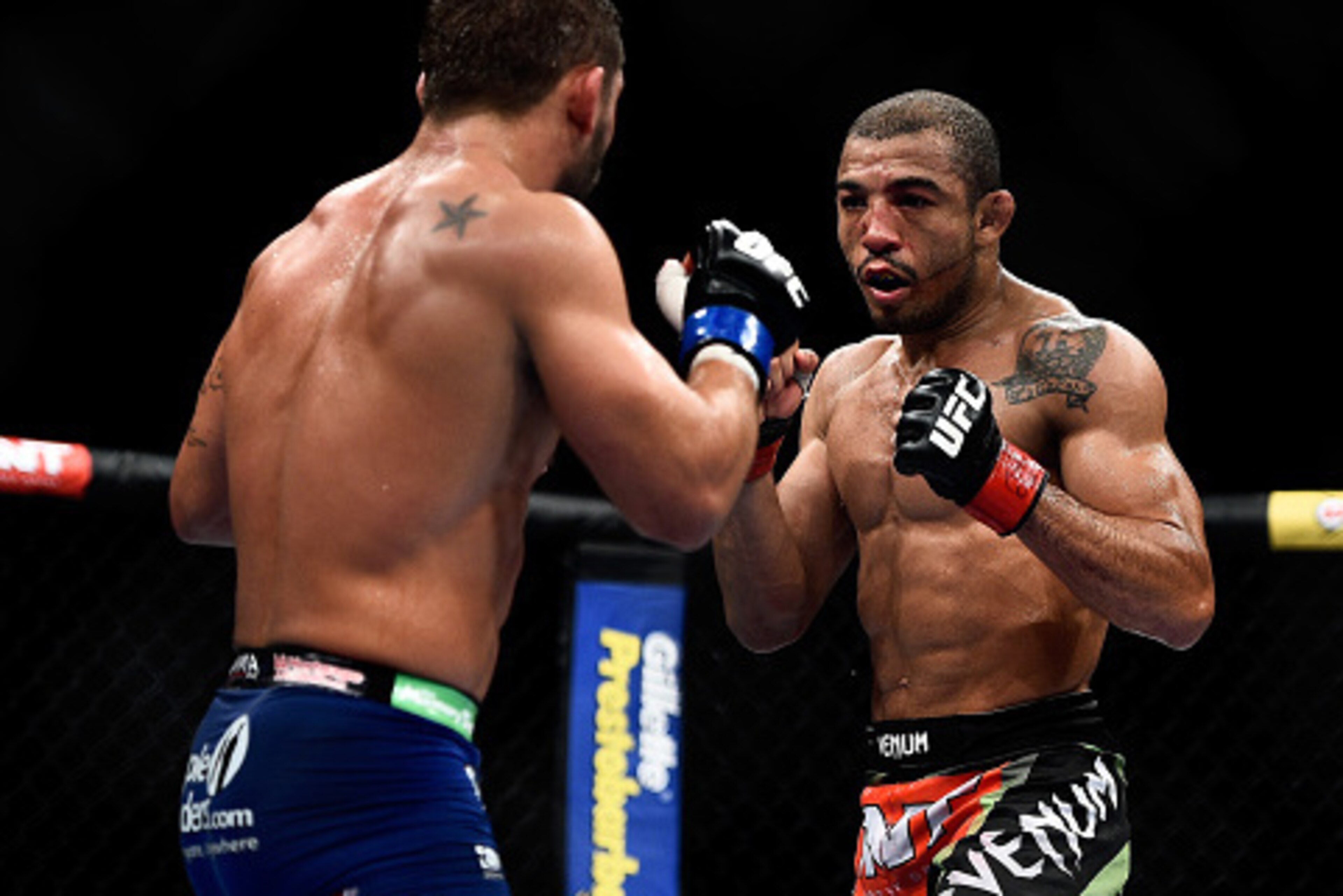 RIO DE JANEIRO, BRAZIL - OCTOBER 25: Chad Mendes of the United States and Jose Aldo of Brazil in their featherweight championship bout during the UFC 179 event at Maracanazinho on October 25, 2014 in Rio de Janeiro, Brazil. (Photo by Buda Mendes/Getty Ima
