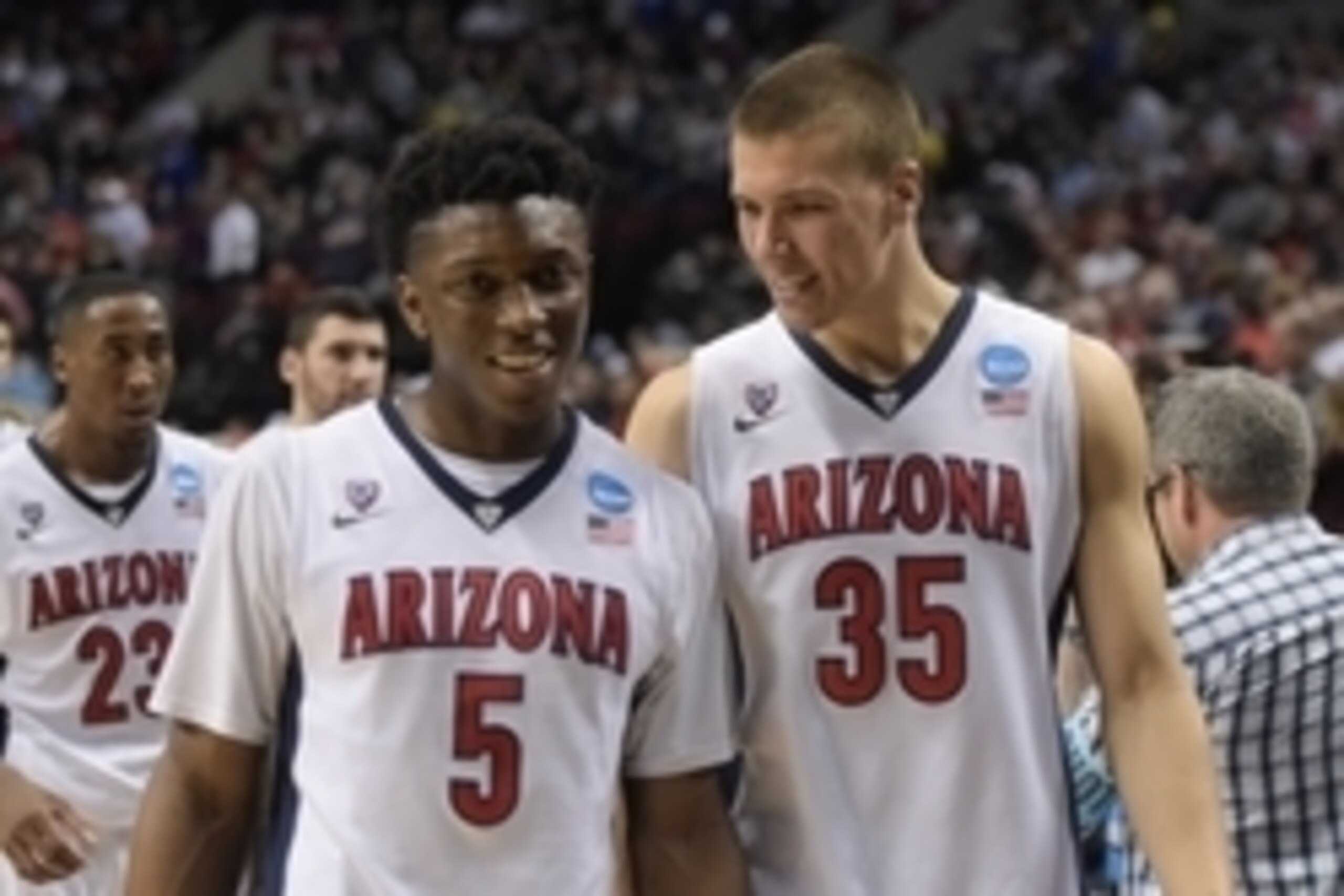 Mar 21, 2015; Portland, OR, USA; Arizona Wildcats forward Stanley Johnson (5) celebrates with center Kaleb Tarczewski (35) after the game against the Ohio State Buckeyes in the third round of the 2015 NCAA Tournament at Moda Center. The Wildcats defeated