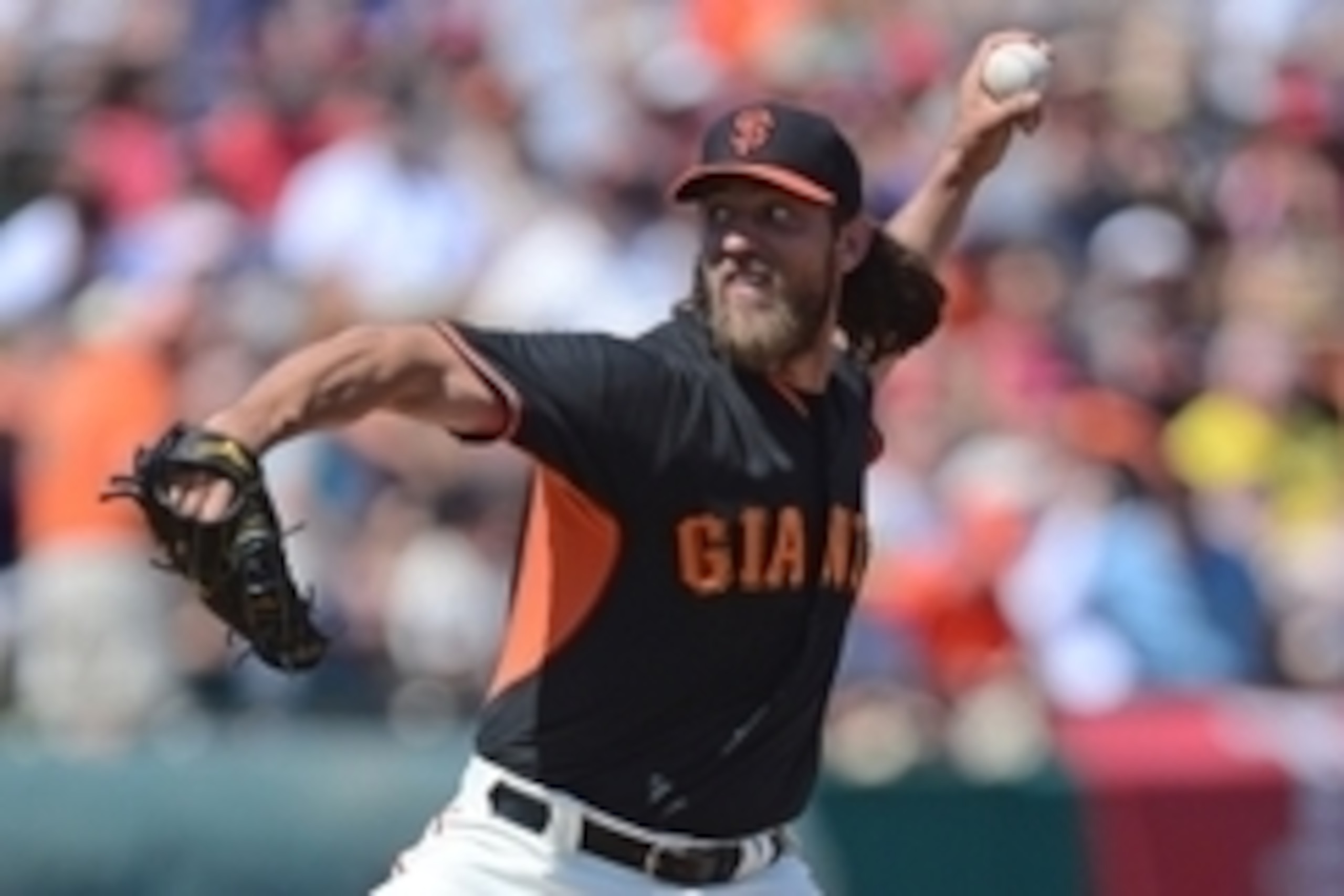Mar 22, 2015; Scottsdale, AZ, USA; San Francisco Giants starting pitcher Madison Bumgarner (40) pitches against the Los Angeles Angels at Scottsdale Stadium. Mandatory Credit: Joe Camporeale-USA TODAY Sports
