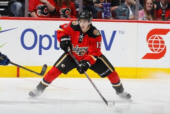 CALGARY, AB - MARCH 13: Johnny Gaudreau #13 of the Calgary Flames skates against the Toronto Maple Leafs at Scotiabank Saddledome on March 13, 2015 in Calgary, Alberta, Canada. (Photo by Gerry Thomas/NHLI via Getty Images)