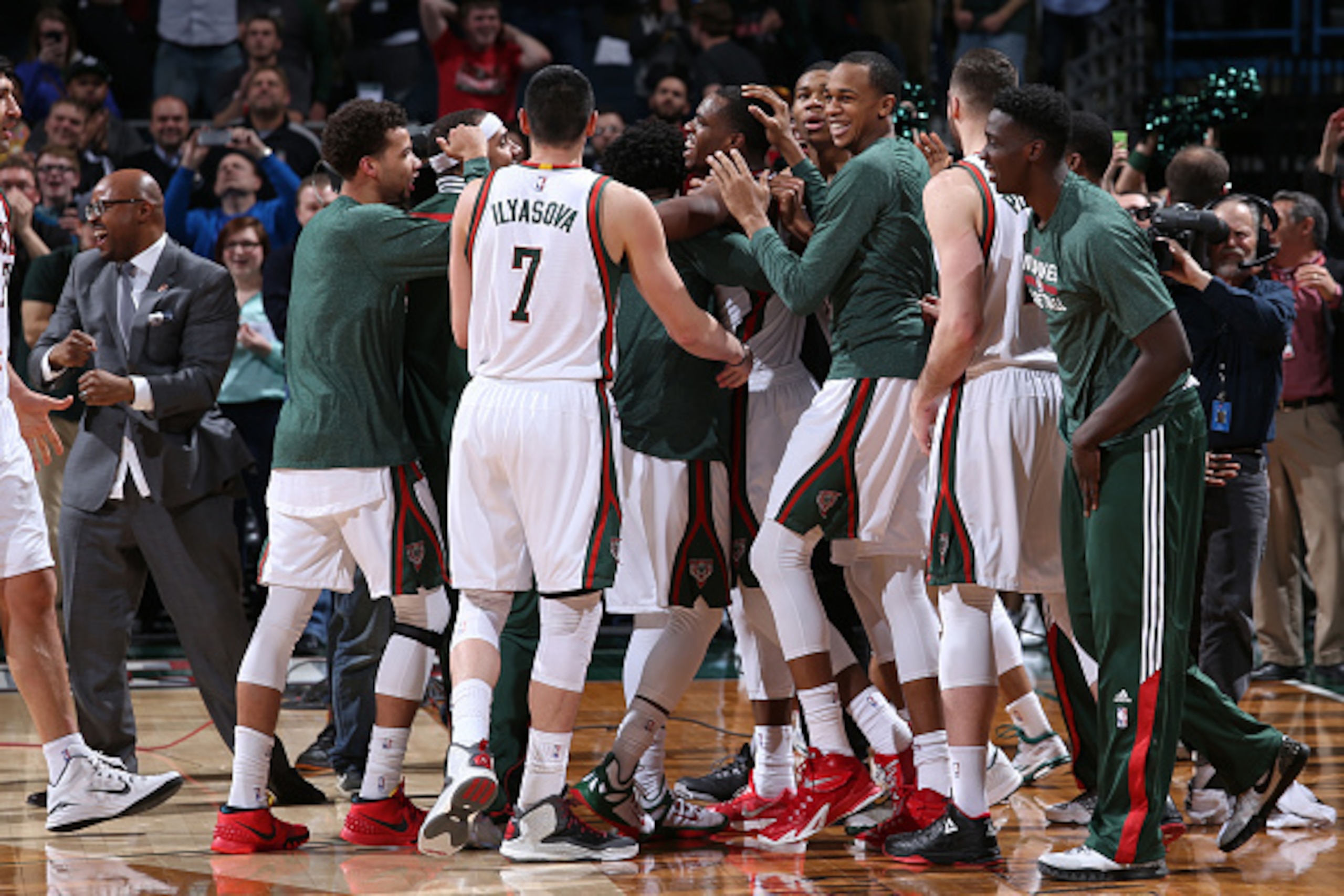 MILWAUKEE, WI - MARCH 24: The Milwaukee Bucks celebrate after winning the game against the Miami Heat on March 24, 2015 at BMO Harris Bradley Center in Milwaukee, Wisconsin. NOTE TO USER: User expressly acknowledges and agrees that, by downloading and/or 
