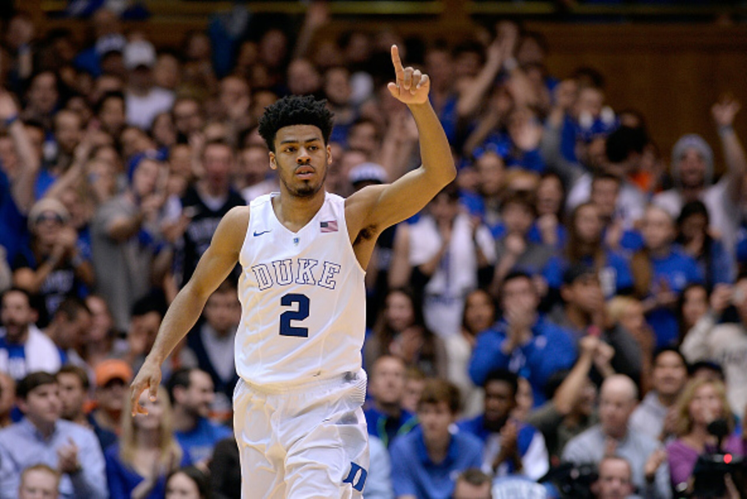 DURHAM, NC - FEBRUARY 28:  Quinn Cook #2 of the Duke Blue Devils reacts after making a three-point basket against the Syracuse Orange during their game at Cameron Indoor Stadium on February 28, 2015 in Durham, North Carolina. Duke won 73-54.  (Photo by Gr