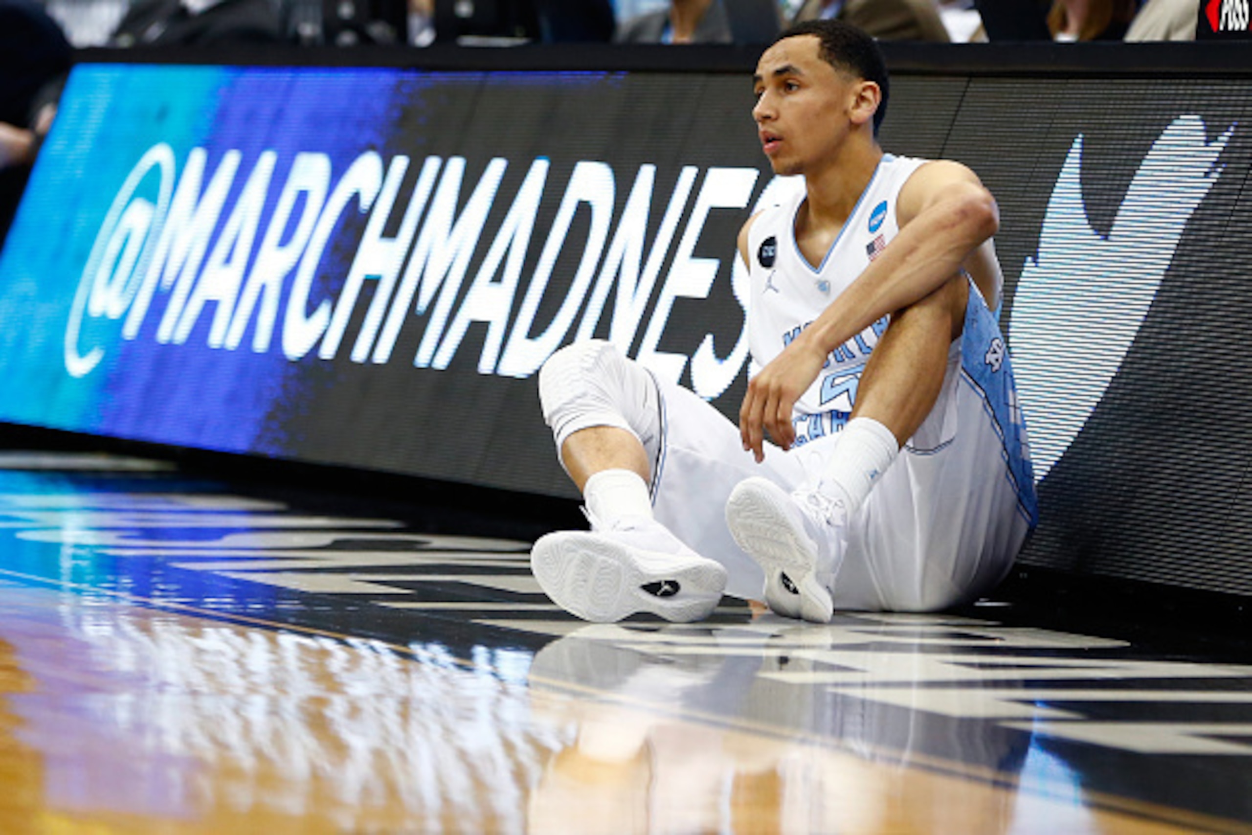 JACKSONVILLE, FL - MARCH 21: Marcus Paige #5 of the North Carolina Tar Heels looks on against the Arkansas Razorbacks in the first half during the third round of the 2015 NCAA Men's Basketball Tournament at Jacksonville Veterans Memorial Arena on March 21