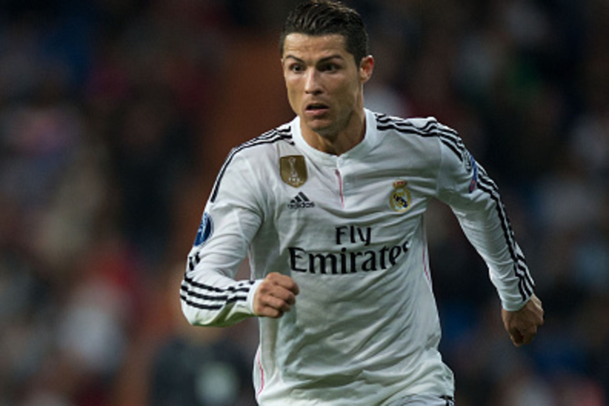 MADRID, SPAIN - MARCH 10: Cristiano Ronaldo of Real Madrid CF controls the ball during the UEFA Champions League round of 16 second leg match between Real Madrid CF and FC Schalke 04 at Estadio Santiago Bernabeu on March 10, 2015 in Madrid, Spain.  (Photo
