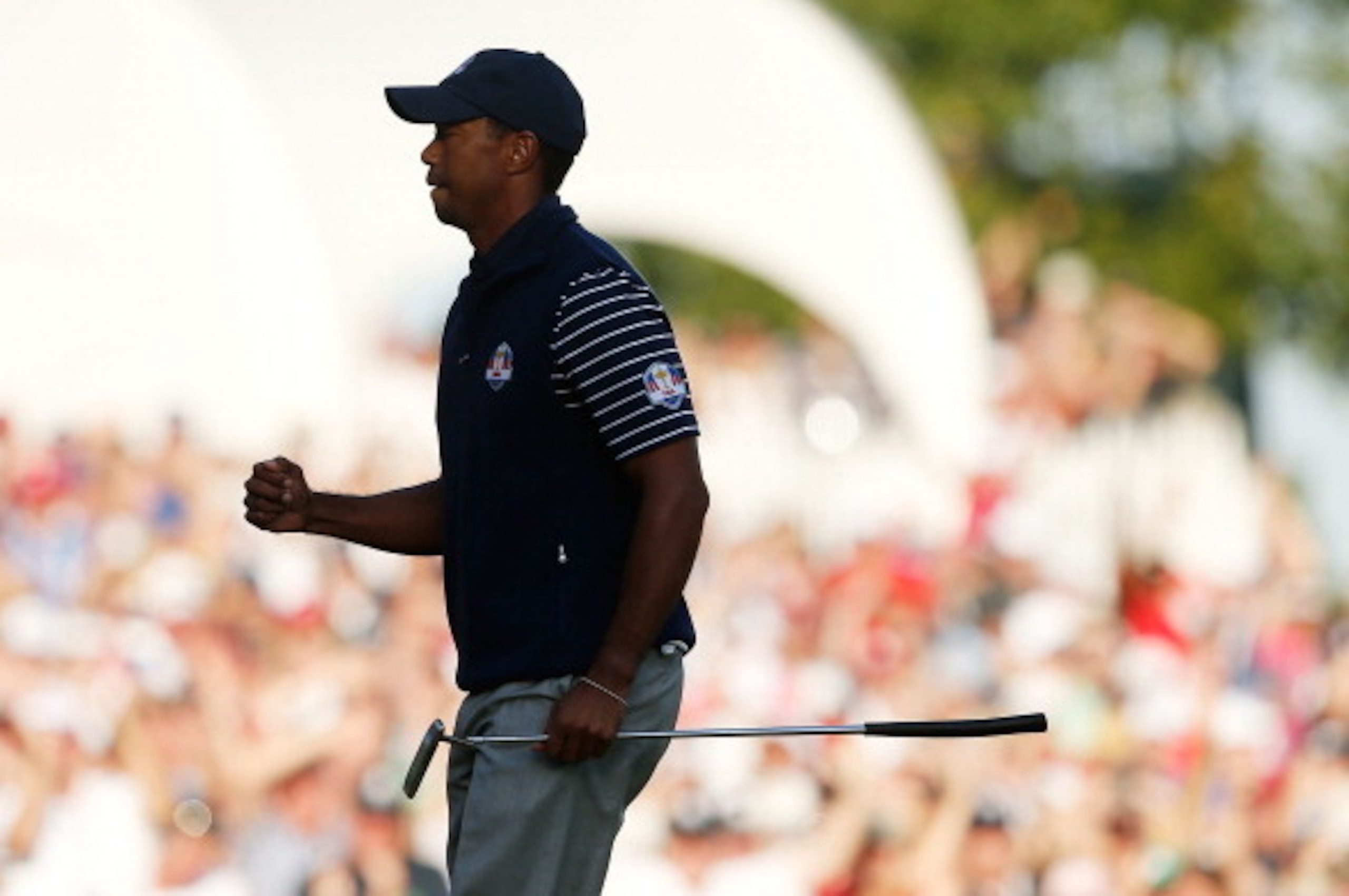 MEDINAH, IL - SEPTEMBER 29: Tiger Woods of the USA celebrates a birdie on the 13th green during day two of the Afternoon Four-Ball Matches for The 39th Ryder Cup at Medinah Country Club on September 29, 2012 in Medinah, Illinois. (Photo by Jamie Squire/ MEDINAH, IL - SEPTEMBER 29: Tiger Woods of the USA celebrates a birdie on the 13th green during day two of the Afternoon Four-Ball Matches for The 39th Ryder Cup at Medinah Country Club on September 29, 2012 in Medinah, Illinois. (Photo by Jamie Squire/