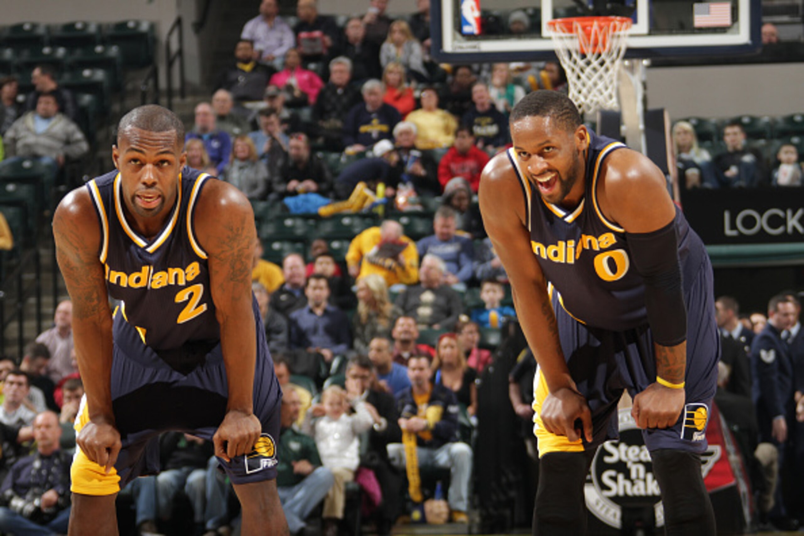 INDIANAPOLIS, IN - FEBRUARY 4:  Rodney Stuckey #2 and C.J. Miles #0 of the Indiana Pacers talk during the game against the Detroit Pistons on February 4, 2015 at Bankers Life Fieldhouse in Indianapolis, Indiana. NOTE TO USER: User expressly acknowledges a