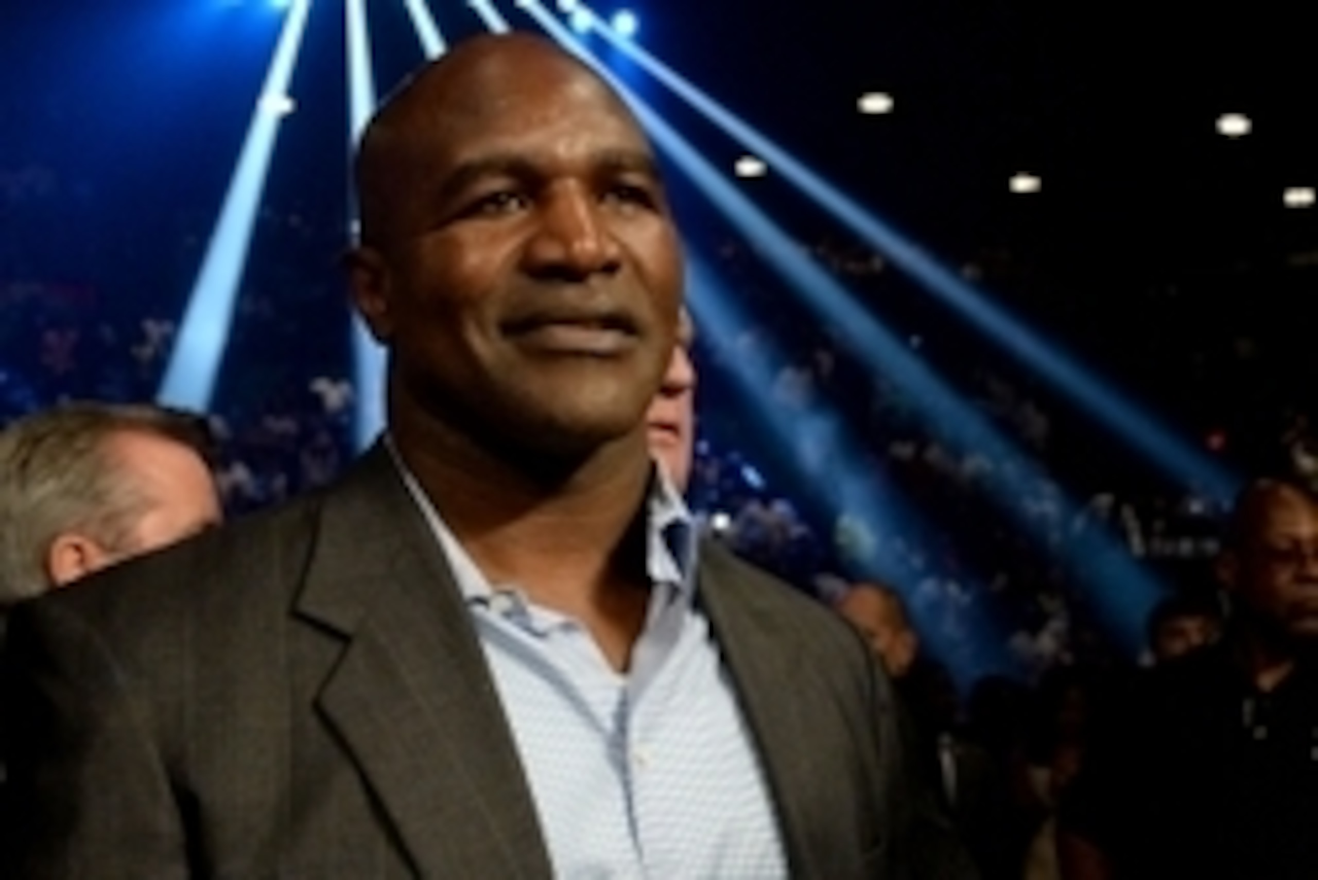 Sep 13, 2014; Las Vegas, NV, USA; Evander Holyfield watches the WBC & WBA Welterweight and WBC Superwelter Weight title fight between Floyd Mayweather and Marcos Maidana at the MGM Grand Garden Arena. Mandatory Credit: Jayne Kamin-Oncea-USA TODAY Sports