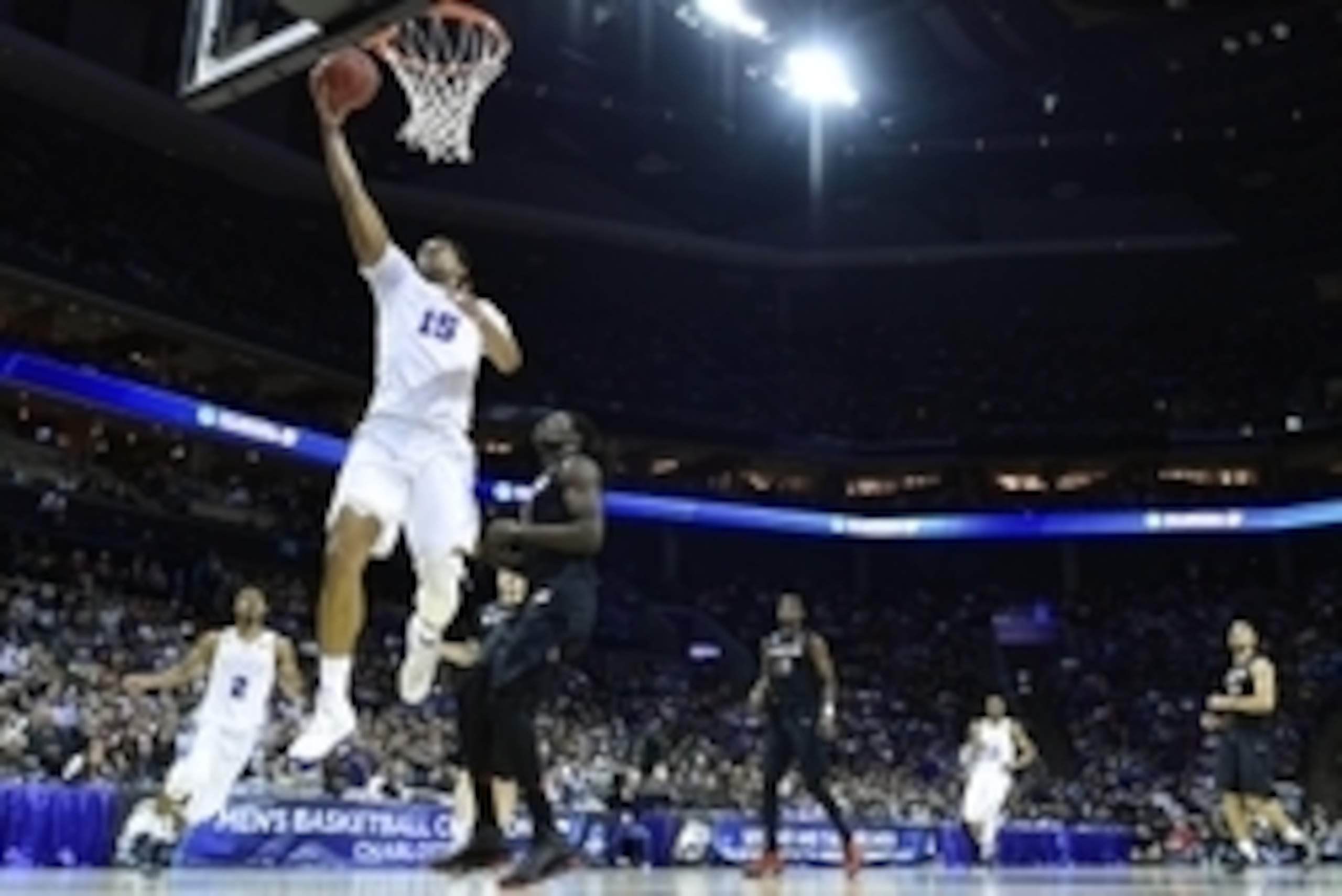 Mar 22, 2015; Charlotte, NC, USA; Duke Blue Devils center Jahlil Okafor (15) shoots the ball against San Diego State Aztecs forward Angelo Chol (3) during the first half in the third round of the 2015 NCAA Tournament at Time Warner Cable Arena. Mandatory 