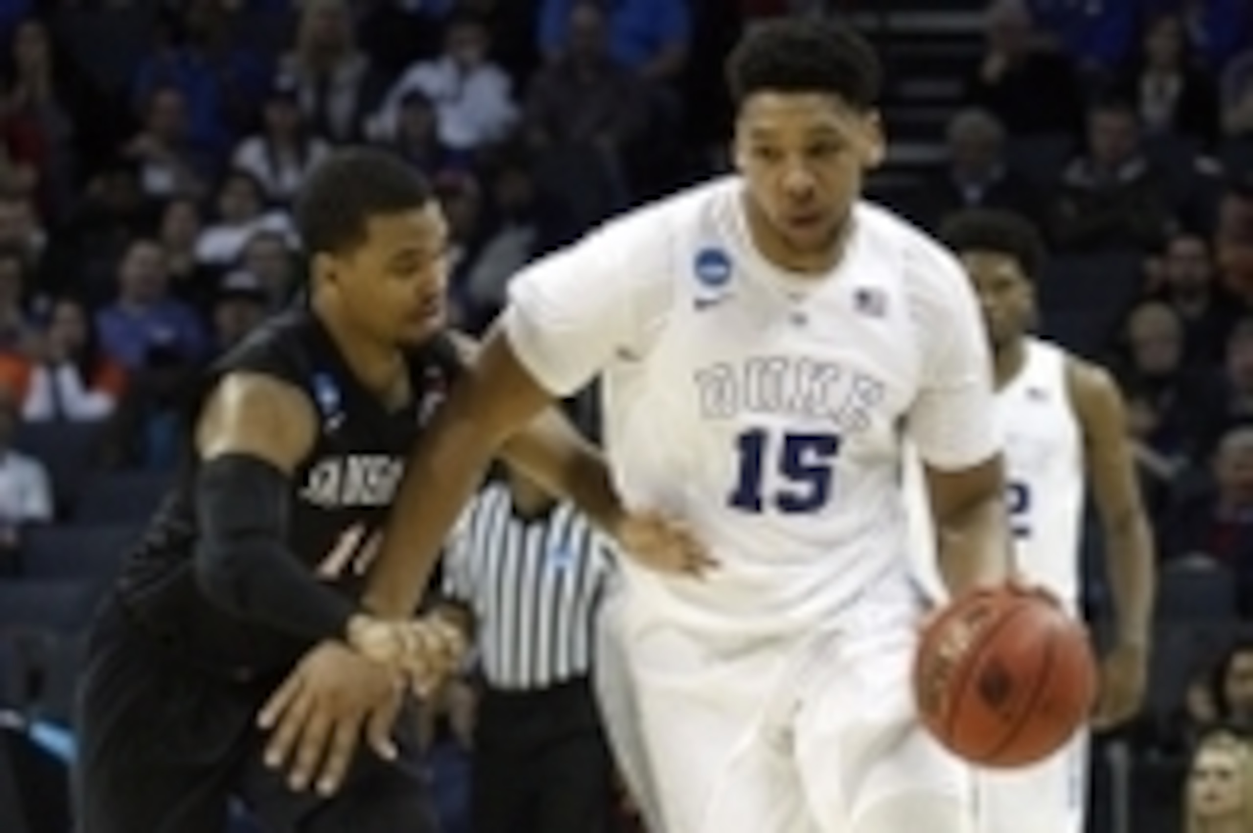 Mar 22, 2015; Charlotte, NC, USA; Duke Blue Devils center Jahlil Okafor (15) brings the ball up courtagainst San Diego State Aztecs guard Aqeel Quinn (10) during the second half in the third round of the 2015 NCAA Tournament at Time Warner Cable Arena. Ma Mar 22, 2015; Charlotte, NC, USA; Duke Blue Devils center Jahlil Okafor (15) brings the ball up courtagainst San Diego State Aztecs guard Aqeel Quinn (10) during the second half in the third round of the 2015 NCAA Tournament at Time Warner Cable Arena. Ma