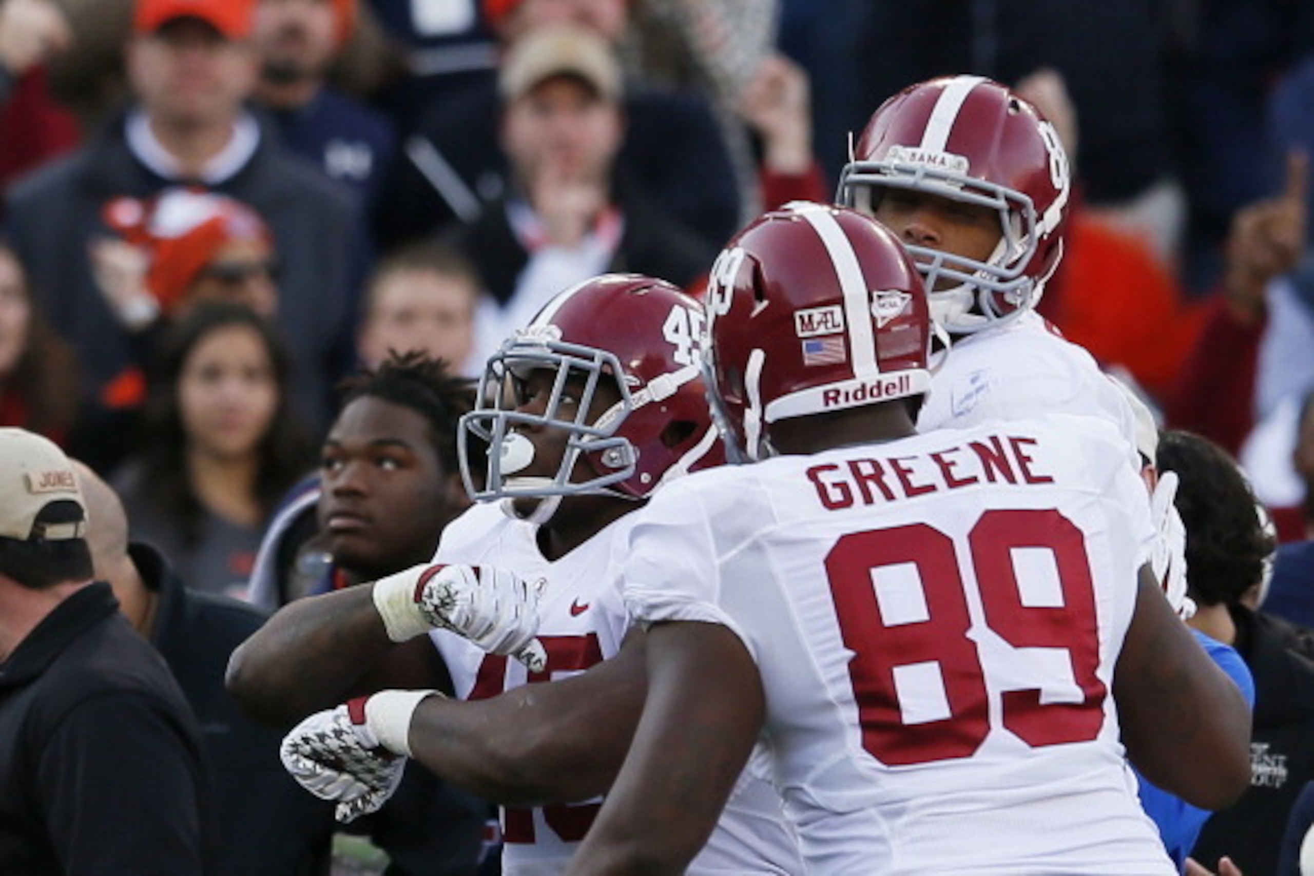 AUBURN, AL - NOVEMBER 30: Jalston Fowler #45, O.J. Howard #88 and Brandon Greene #89 of the Alabama Crimson Tide celebrate Fowler's second quarter touchdown against the Auburn Tigers at Jordan-Hare Stadium on November 30, 2013 in Auburn, Alabama. (Photo AUBURN, AL - NOVEMBER 30: Jalston Fowler #45, O.J. Howard #88 and Brandon Greene #89 of the Alabama Crimson Tide celebrate Fowler's second quarter touchdown against the Auburn Tigers at Jordan-Hare Stadium on November 30, 2013 in Auburn, Alabama. (Photo