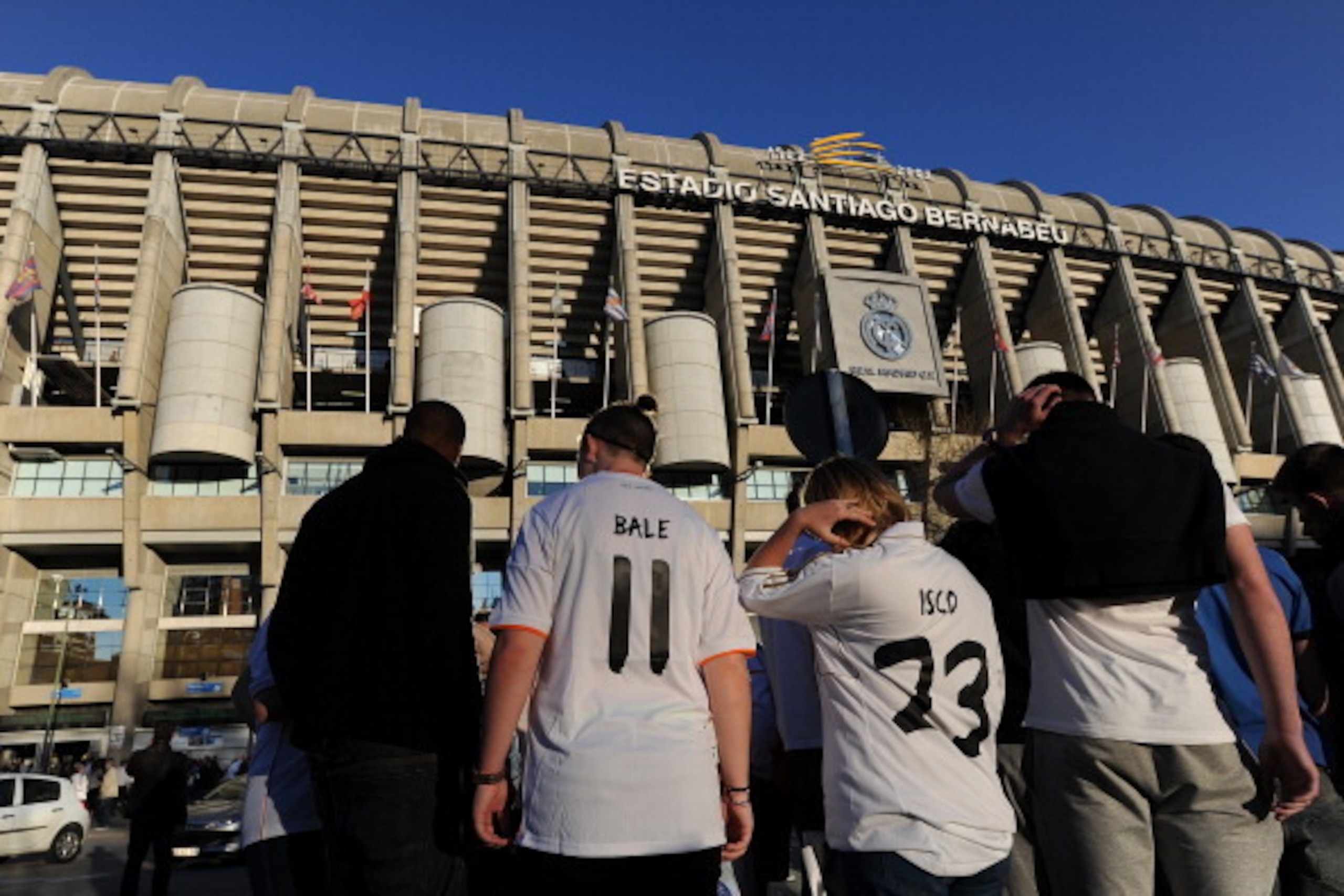 MADRID, SPAIN - MARCH 09:  Real Madrid CF fans gather outside their Santiago Bernabeu stadium before the La Liga match between Real Madrid CF and Levante UD at Santiago Bernabeu stadium on March 9, 2014 in Madrid, Spain.  (Photo by Denis Doyle/Getty Image