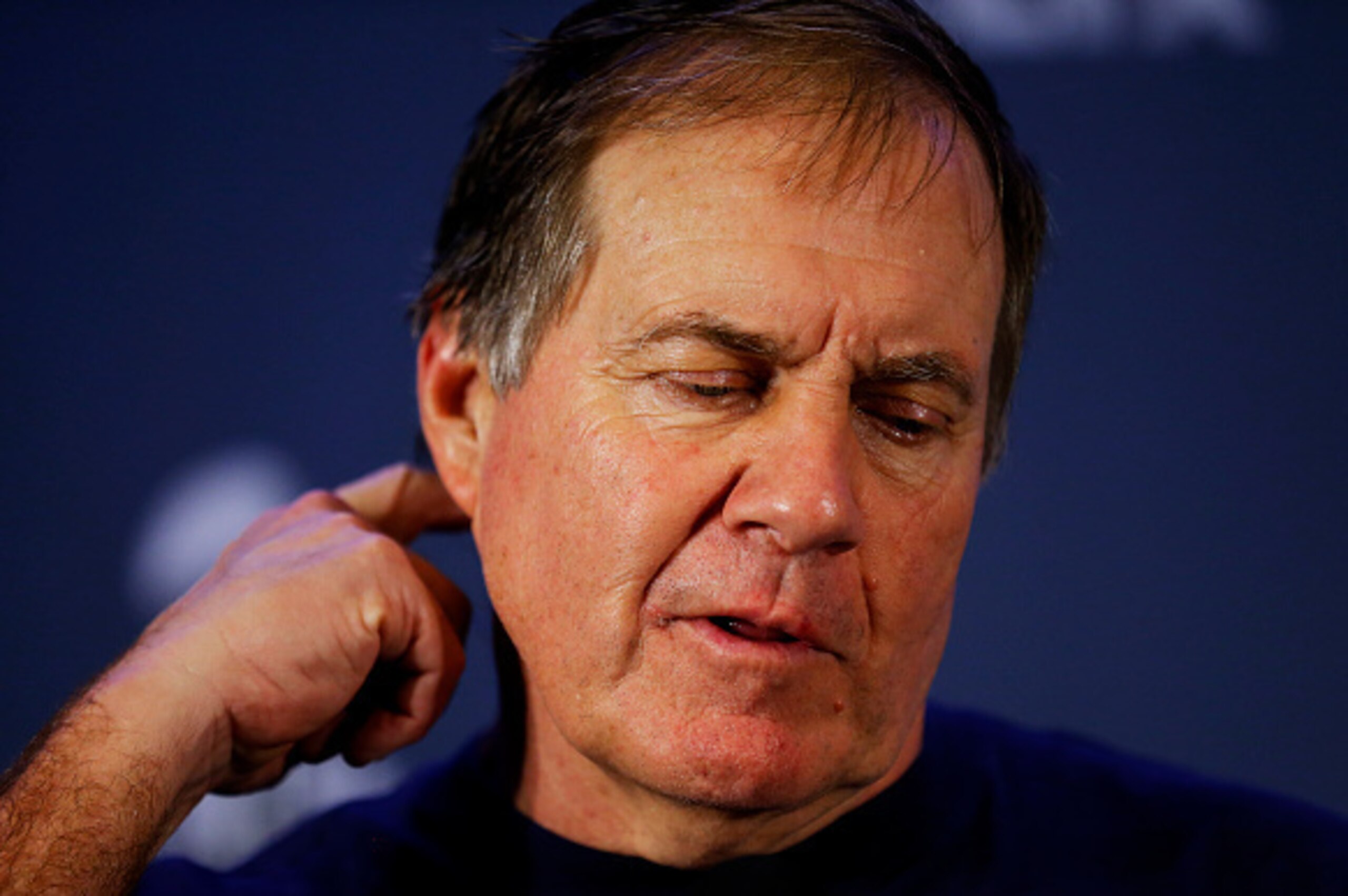 GLENDALE, AZ - FEBRUARY 01:  Head Coach Bill Belichick of the New England Patriots talks to the media after winning Super Bowl XLIX 28-24 against the Seattle Seahawks at University of Phoenix Stadium on February 1, 2015 in Glendale, Arizona.  (Photo by To