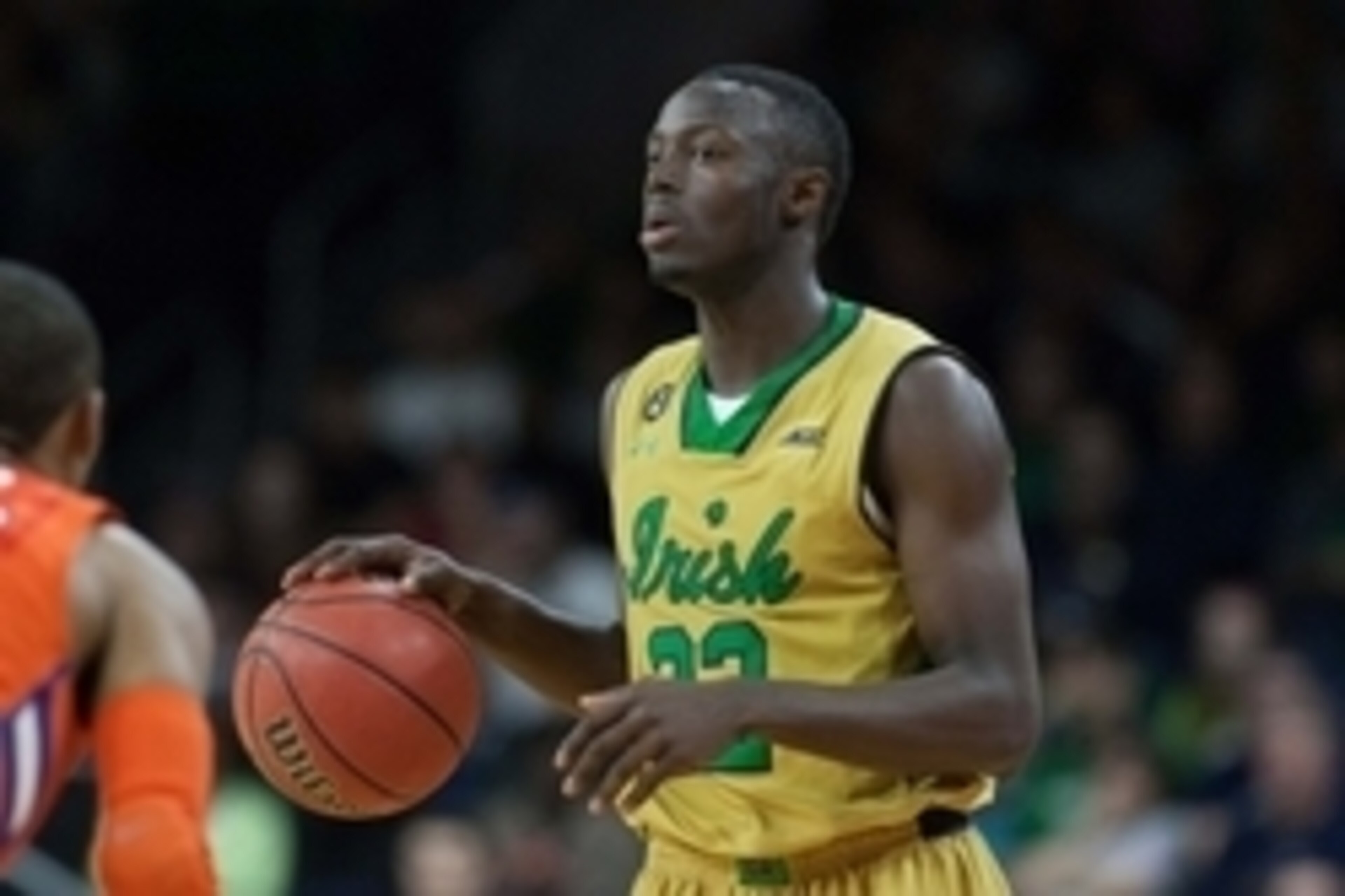 Mar 7, 2015; South Bend, IN, USA; Notre Dame Fighting Irish guard Jerian Grant (22) dribbles the ball in the second half of the game against the Clemson Tigers at Purcell Pavilion at the Joyce Center. The Notre Dame Fighting Irish beat the Clemson Tigers 
