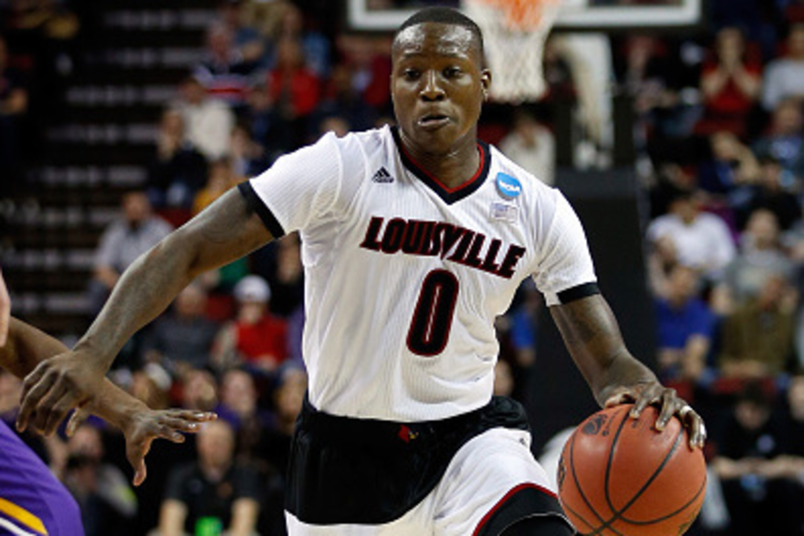 SEATTLE, WA - MARCH 22:  Terry Rozier #0 of the Louisville Cardinals dribbles in the second half of the game against the Northern Iowa Panthers during the third round of the 2015 NCAA Men's Basketball Tournament at KeyArena on March 22, 2015 in Seattle, W