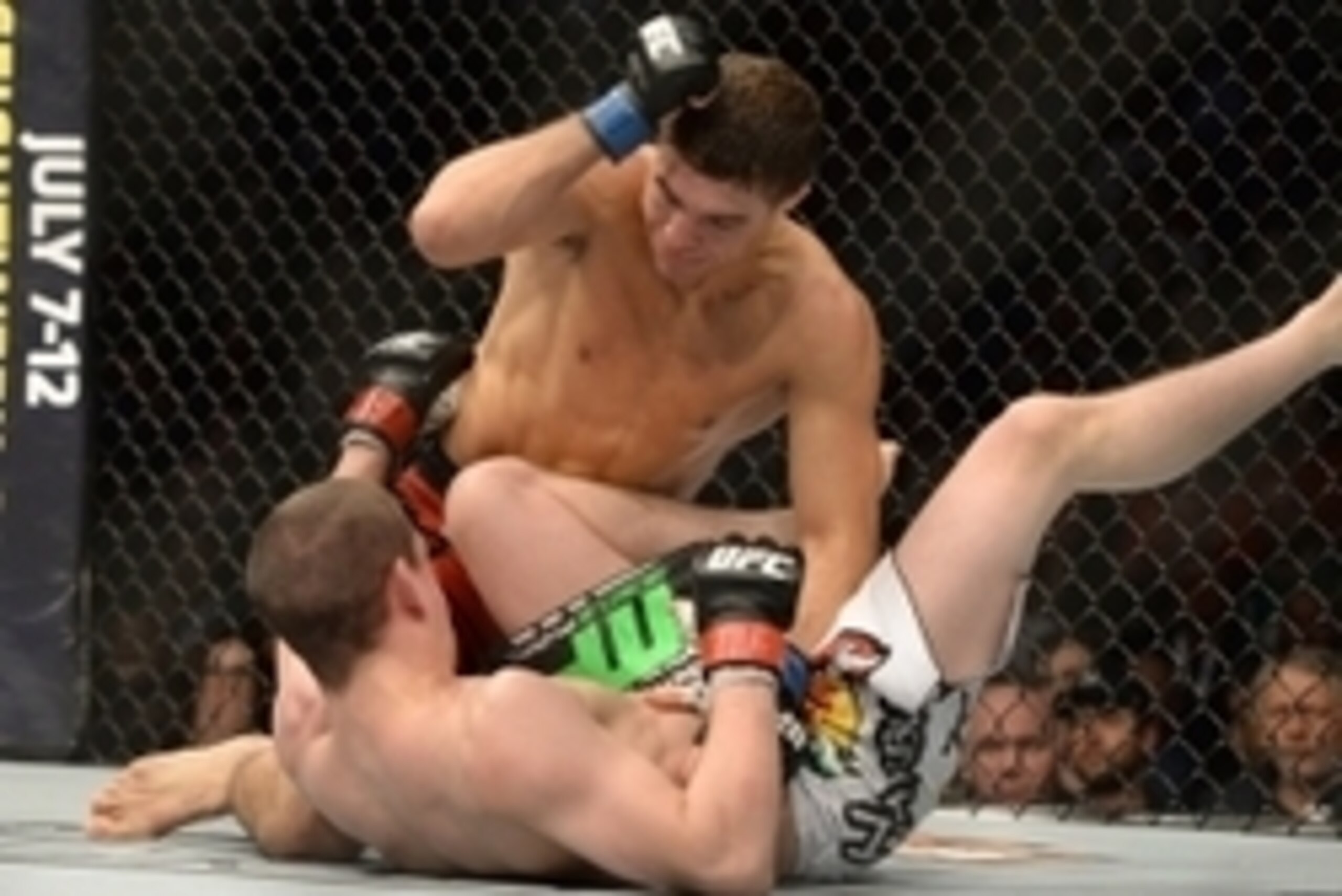 Jan 31, 2015; Las Vegas, NV, USA; Al Iaquinta (blue gloves) punches on Joe Lauzon (red gloves) during their lightweight bout during UFC 183 at the MGM Grand Garden Arena. Mandatory Credit: Jayne Kamin-Oncea-USA TODAY Sports