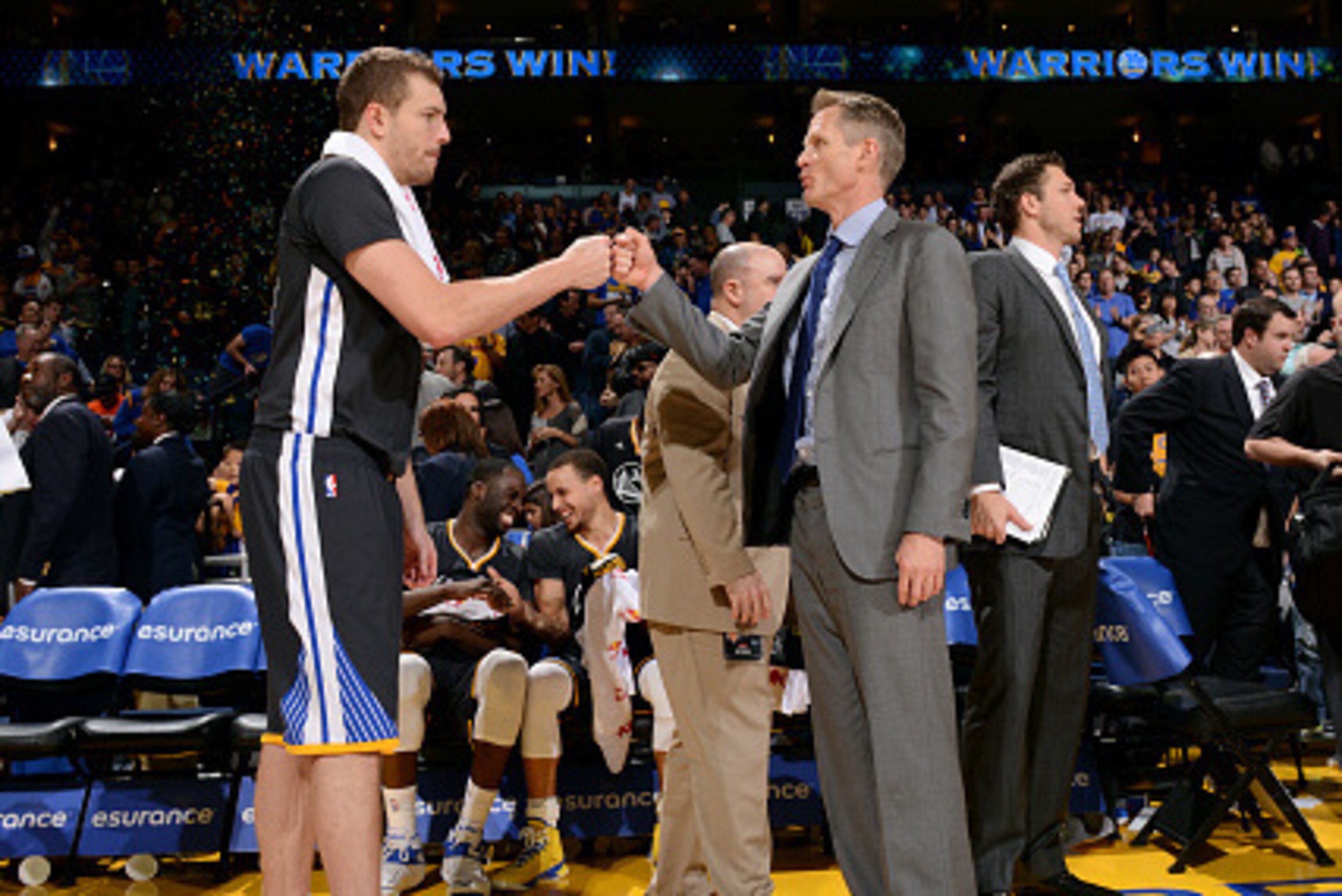 OAKLAND, CA - JANUARY 31: David Lee #10 and head coach Steve Kerr of the Golden State Warriors celebrate during a game against the Phoenix Suns on January 31, 2015 at Oracle Arena in Oakland, California. NOTE TO USER: User expressly acknowledges and agree