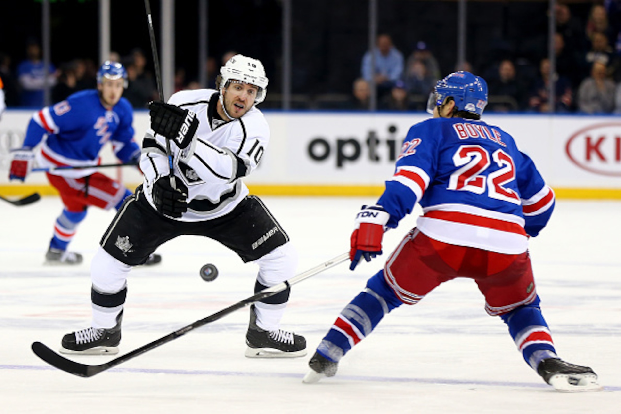 NEW YORK, NY - MARCH 24:  Mike Richards #10 of the Los Angeles Kings and Dan Boyle #22 of the New York Rangers fight for the loose puck n March 24, 2015 at Madison Square Garden in New York City.The Los Angeles Kings defeated the New York Rangers 4-2.  (P