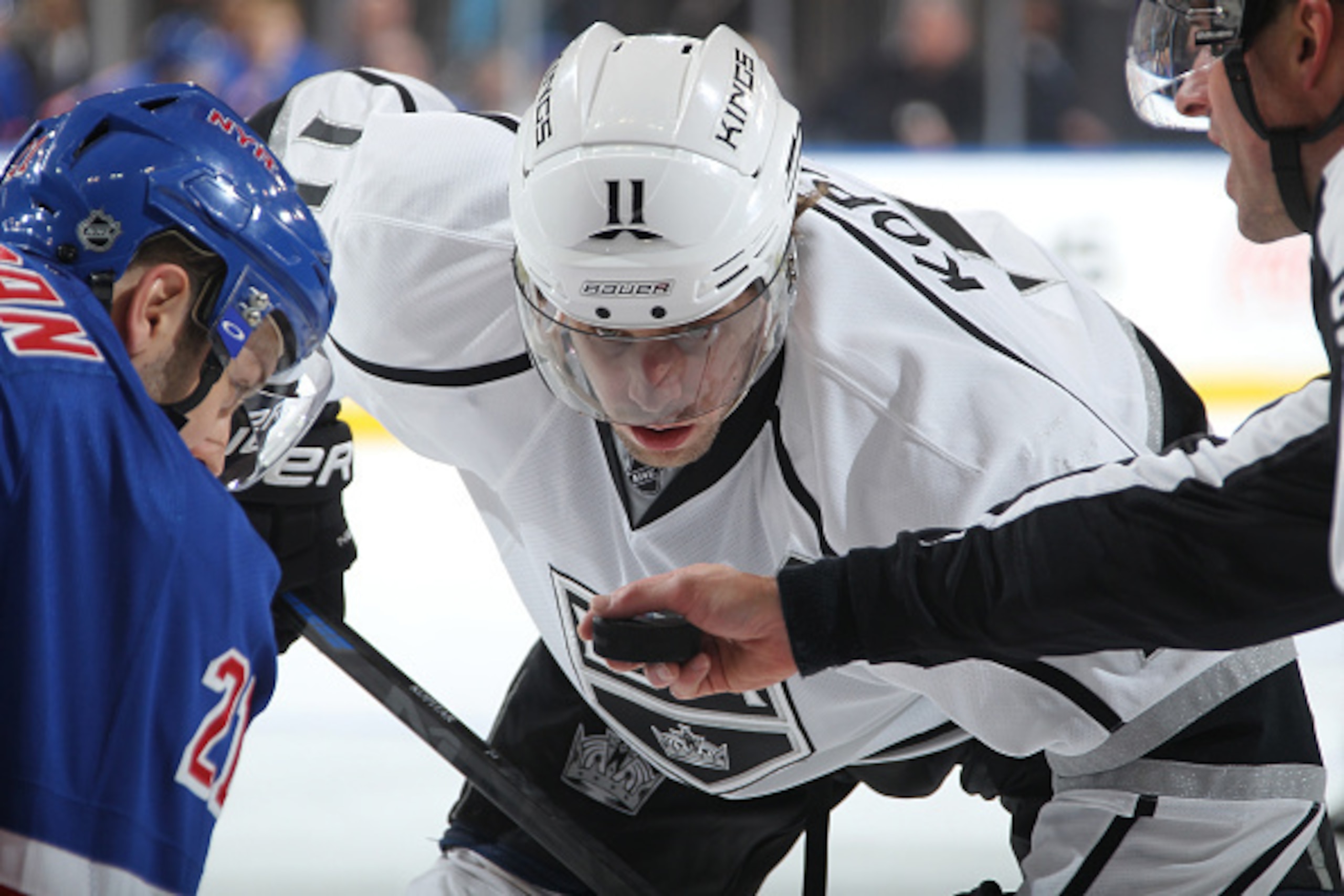 NEW YORK, NY - MARCH 24: Anze Kopitar #11 of the Los Angeles Kings looks at the puck during a face off against Derek Stepan #21 of the New York Rangers at Madison Square Garden on March 24, 2015 in New York City. (Photo by Jared Silber/NHLI via Getty Imag