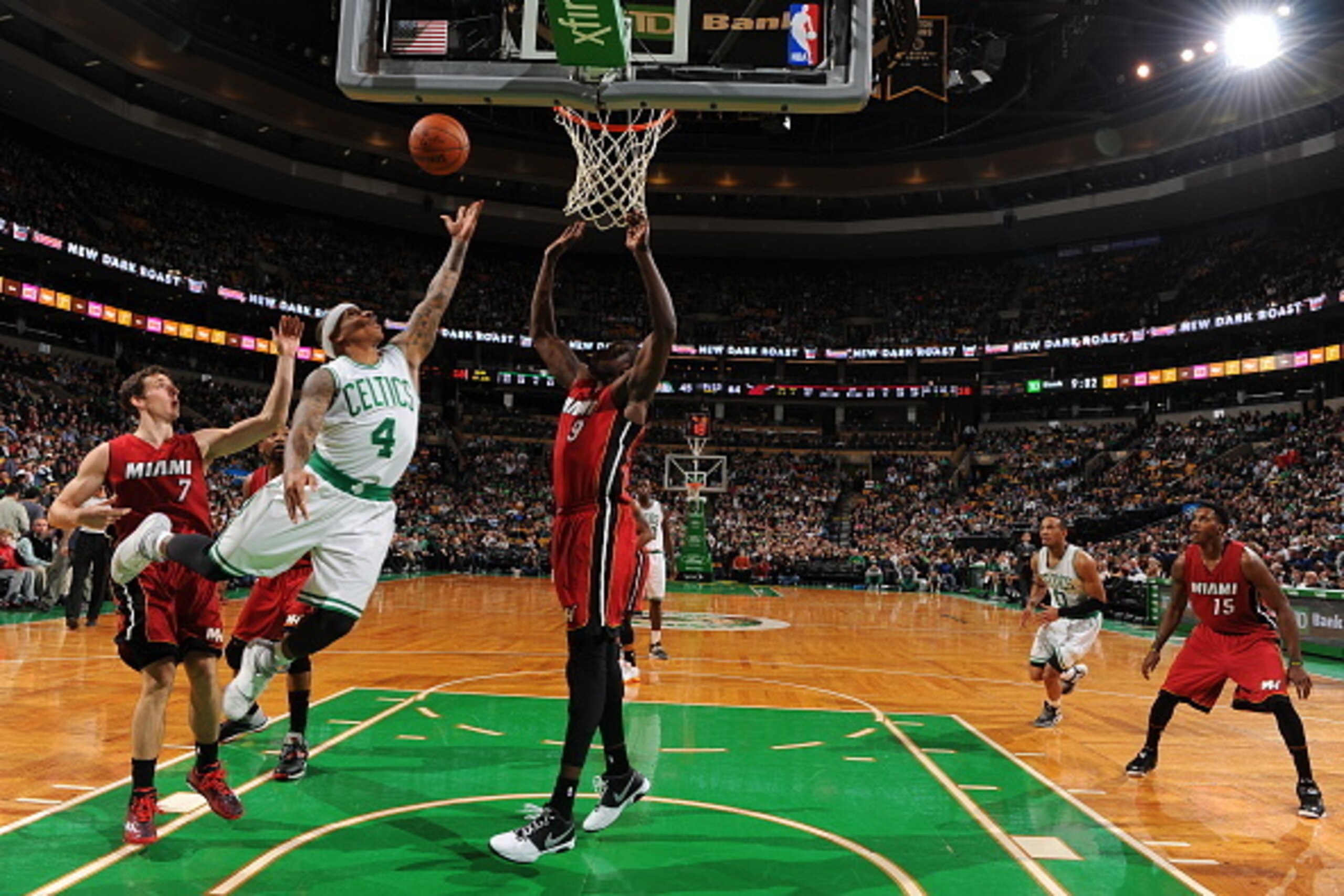 BOSTON, MA - MARCH 25:  Isaiah Thomas #4 of the Boston Celtics shoots against the Miami Heat on March 25, 2015 at TD Garden in Boston, Massachusetts.  NOTE TO USER: User expressly acknowledges and agrees that, by downloading and or using this Photograph, 