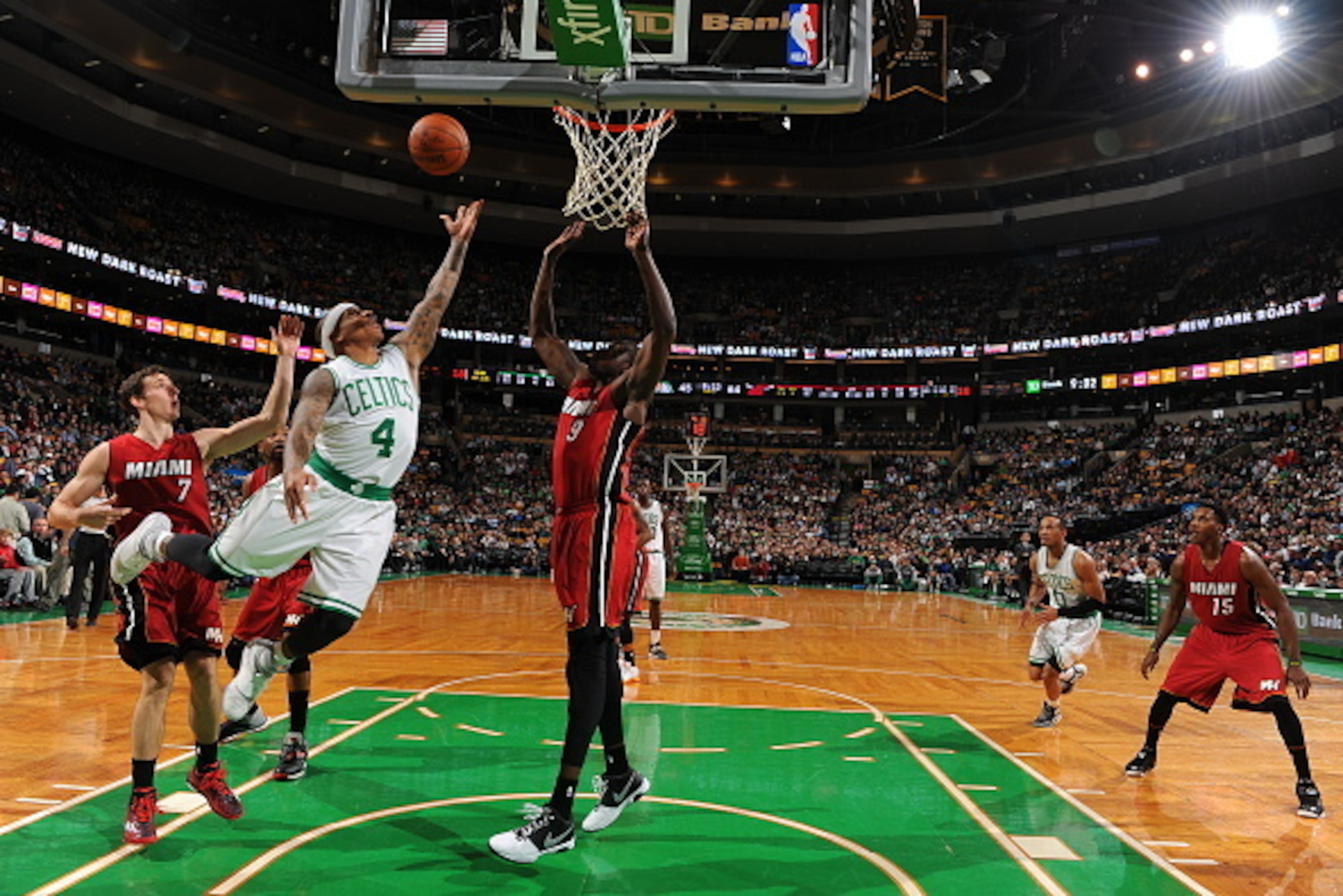 BOSTON, MA - MARCH 25:  Isaiah Thomas #4 of the Boston Celtics shoots against the Miami Heat on March 25, 2015 at TD Garden in Boston, Massachusetts.  NOTE TO USER: User expressly acknowledges and agrees that, by downloading and or using this Photograph, 