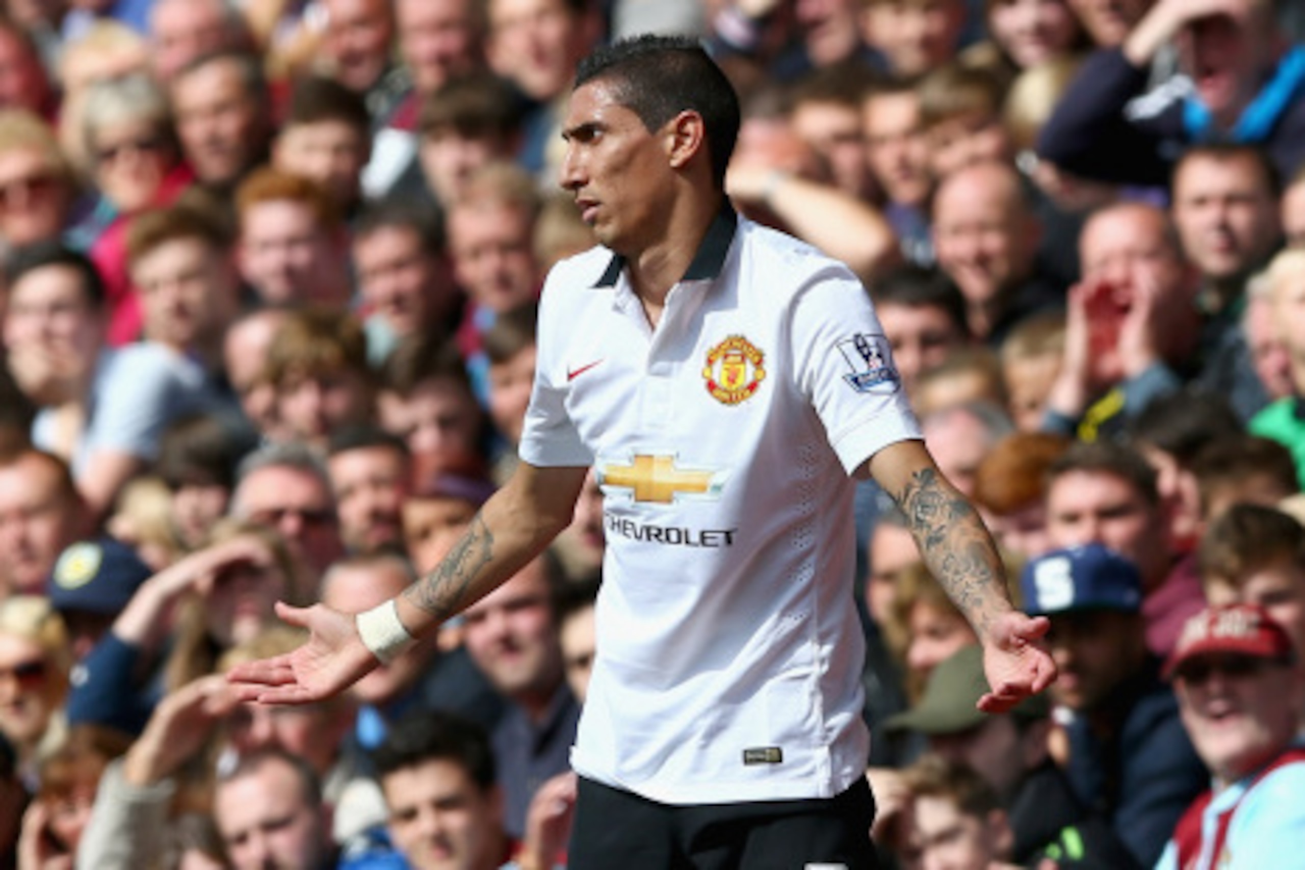 BURNLEY, ENGLAND - AUGUST 30:  Angel Di Maria of Manchester United shows his emotions during the Barclays Premier League match between Burnley and Manchester United at Turf Moor on August 30, 2014 in Burnley, England.  (Photo by Clive Brunskill/Getty Imag