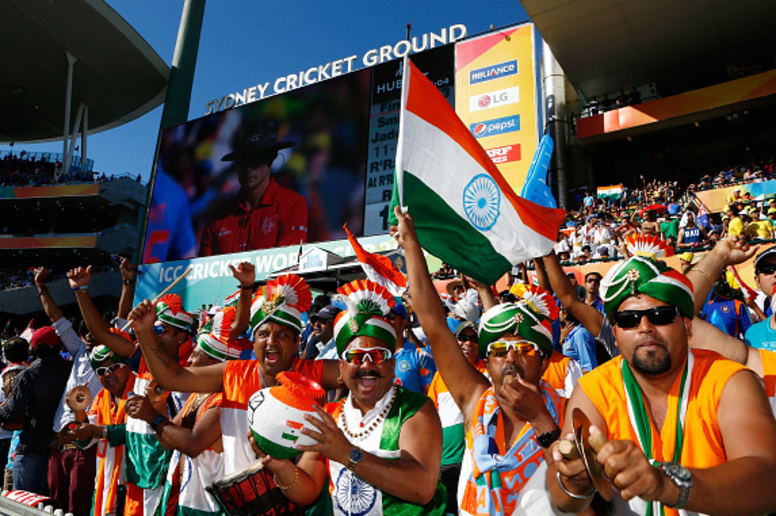 SYDNEY, AUSTRALIA - MARCH 26:  India fans cheer during the 2015 Cricket World Cup Semi Final match between Australia and India at Sydney Cricket Ground on March 26, 2015 in Sydney, Australia.  (Photo by Daniel Munoz/Getty Images)