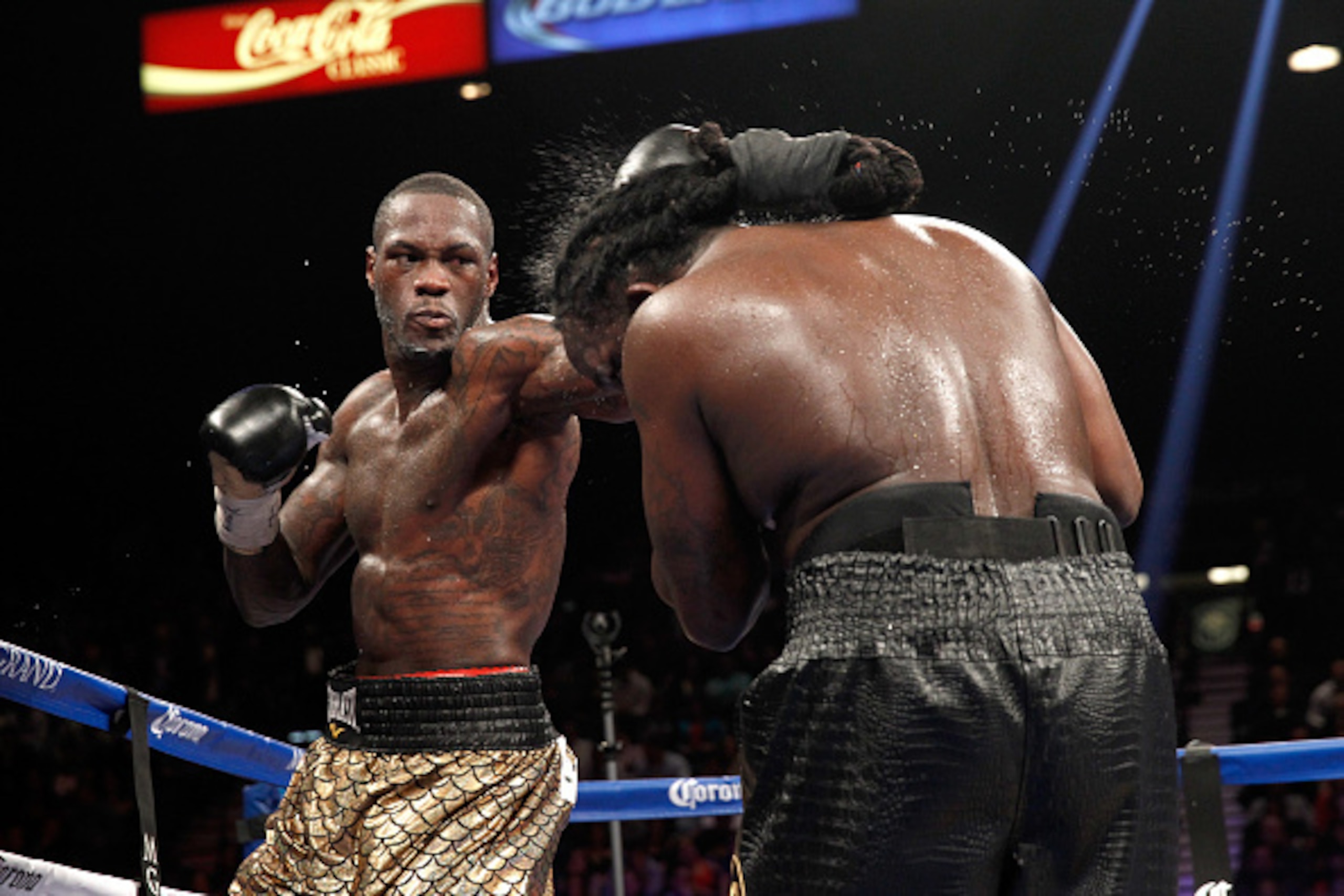 LAS VEGAS, NV - JANUARY 17:  Deontay Wilder connects on WBC heavyweight champion Bermane Stiverne during their title fight at the MGM Grand Garden Arena on January 17, 2015 in Las Vegas, Nevada. Wilder took the title by unanimous decision.  (Photo by Stev