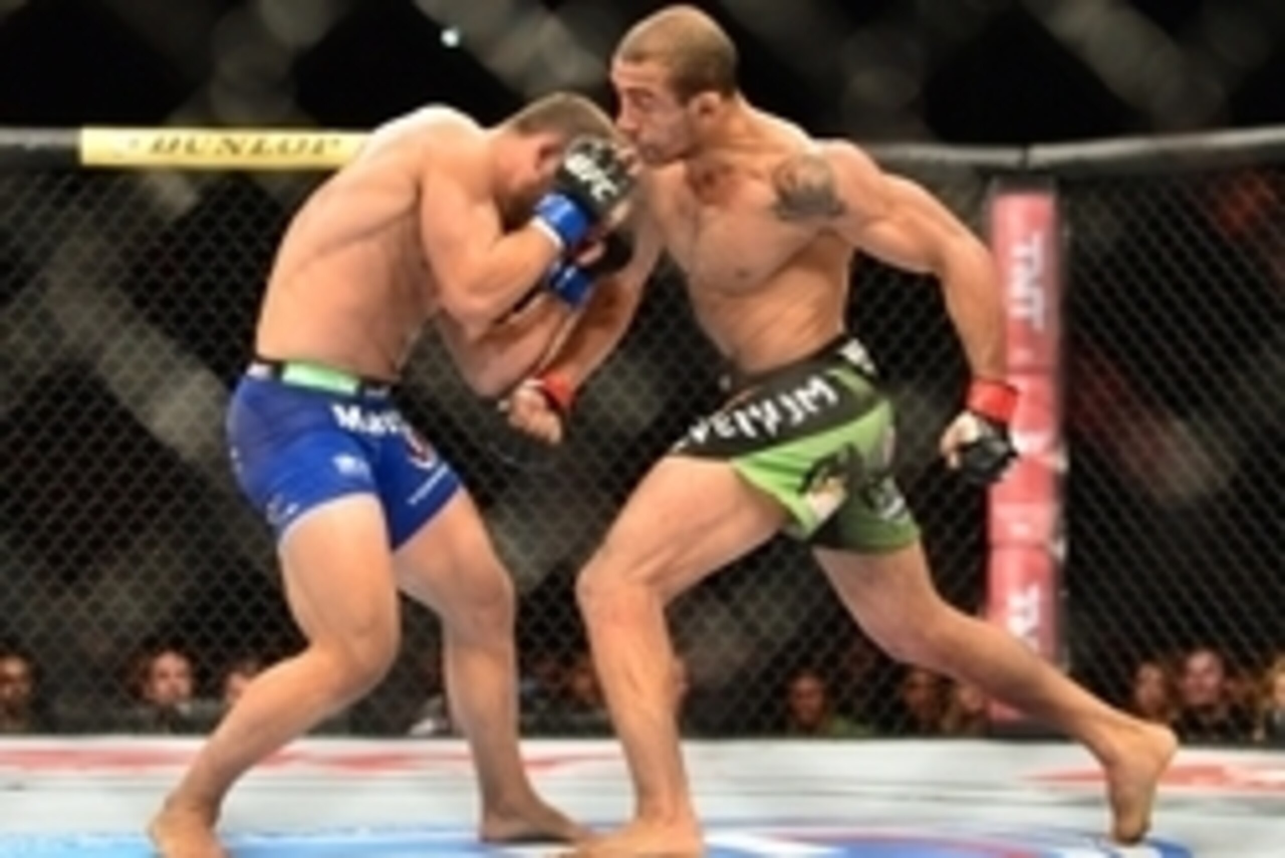 Oct 25, 2014; Rio de Janeiro, Brazil; Jose Aldo (red gloves) fights against Chad Mendez (blue gloves) during UFC 179 at Ginasio do Maracanazinho. Mandatory Credit: Jason Silva-USA TODAY Sports