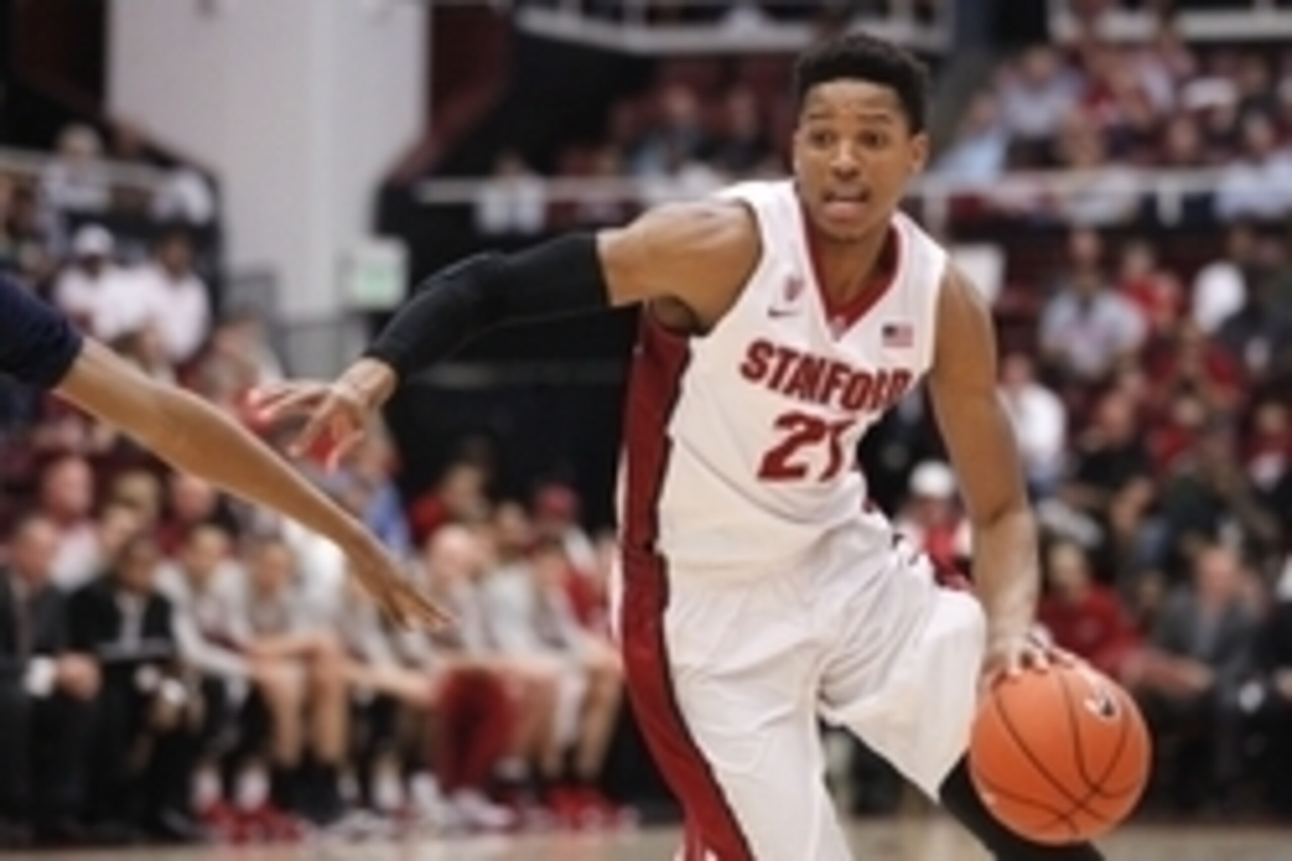 Feb 21, 2015; Stanford, CA, USA; Stanford Cardinal forward Anthony Brown (21) dribbles the ball against the California Golden Bears in the first half at Maples Pavilion. Mandatory Credit: Cary Edmondson-USA TODAY Sports